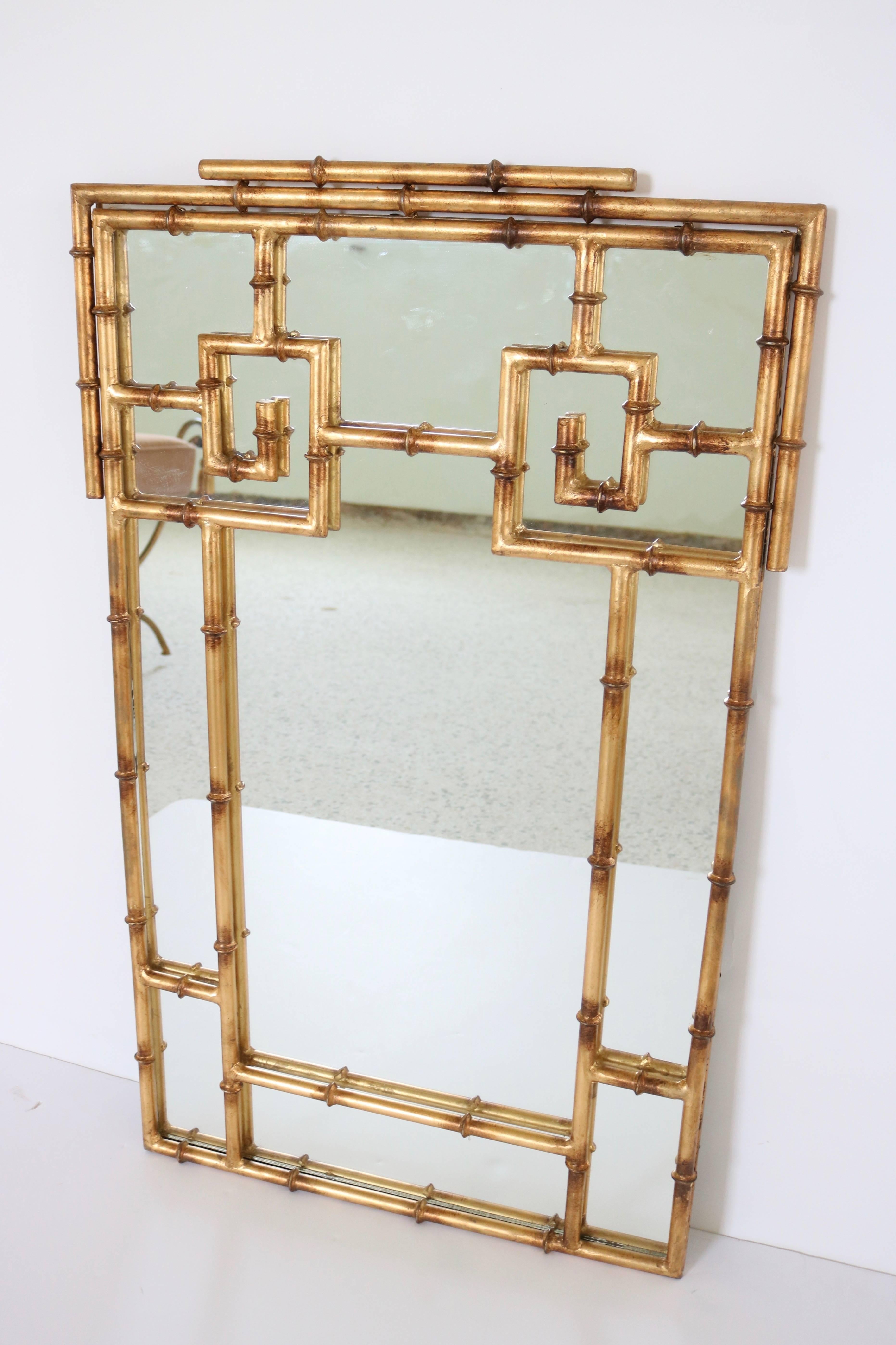 This stylish mirror is very much in the style of pieces created and adored by Tony Duquette during the height of the Hollywood Regency period. 

For best net trade price or additional questions regarding this item, please click the 
