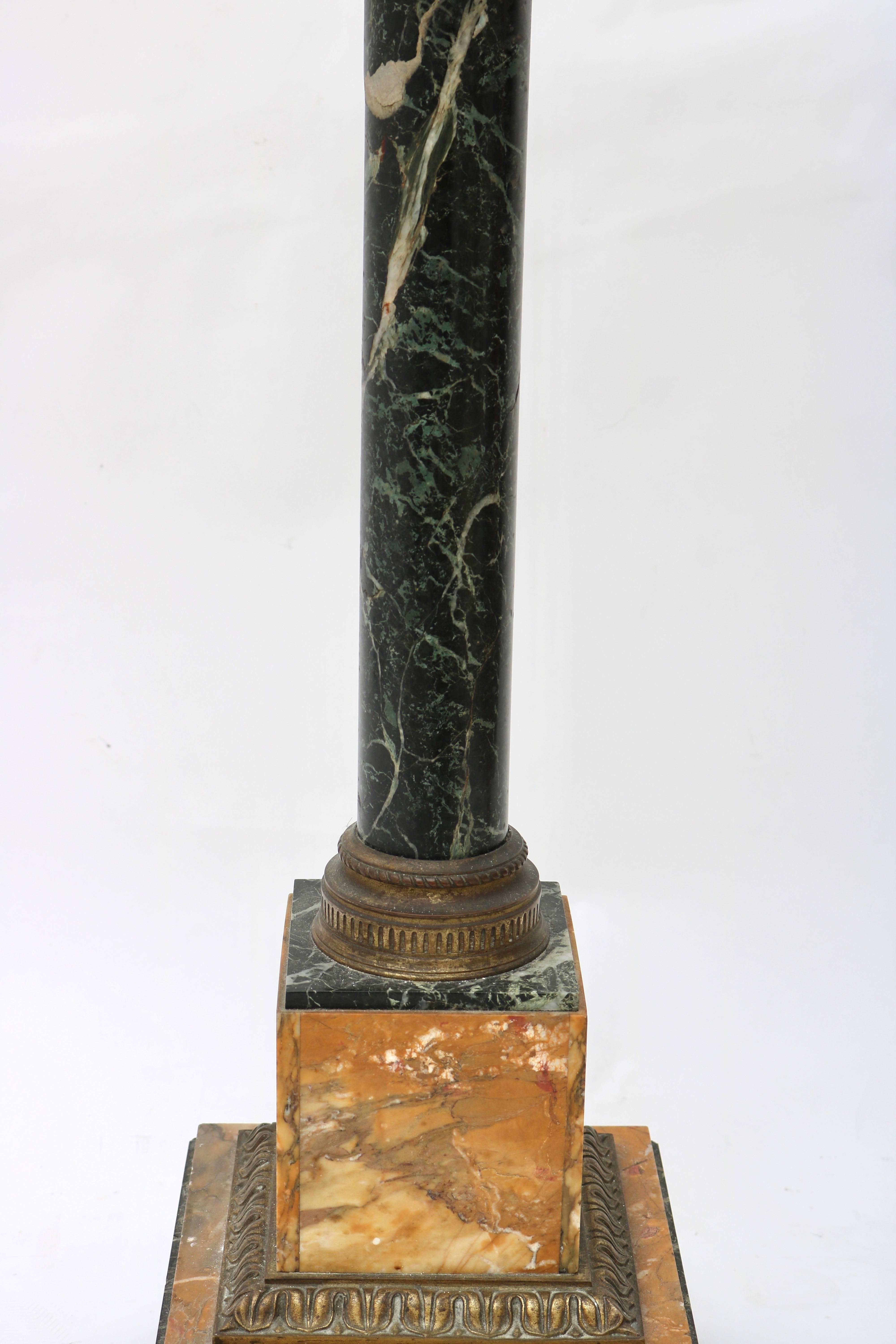 This stylish pedestal dates from the late 19th century and is fabricated with a Verdi green and golden colored marbles with bronze mounts.

For best net trade price or additional questions regarding this item, please click the 