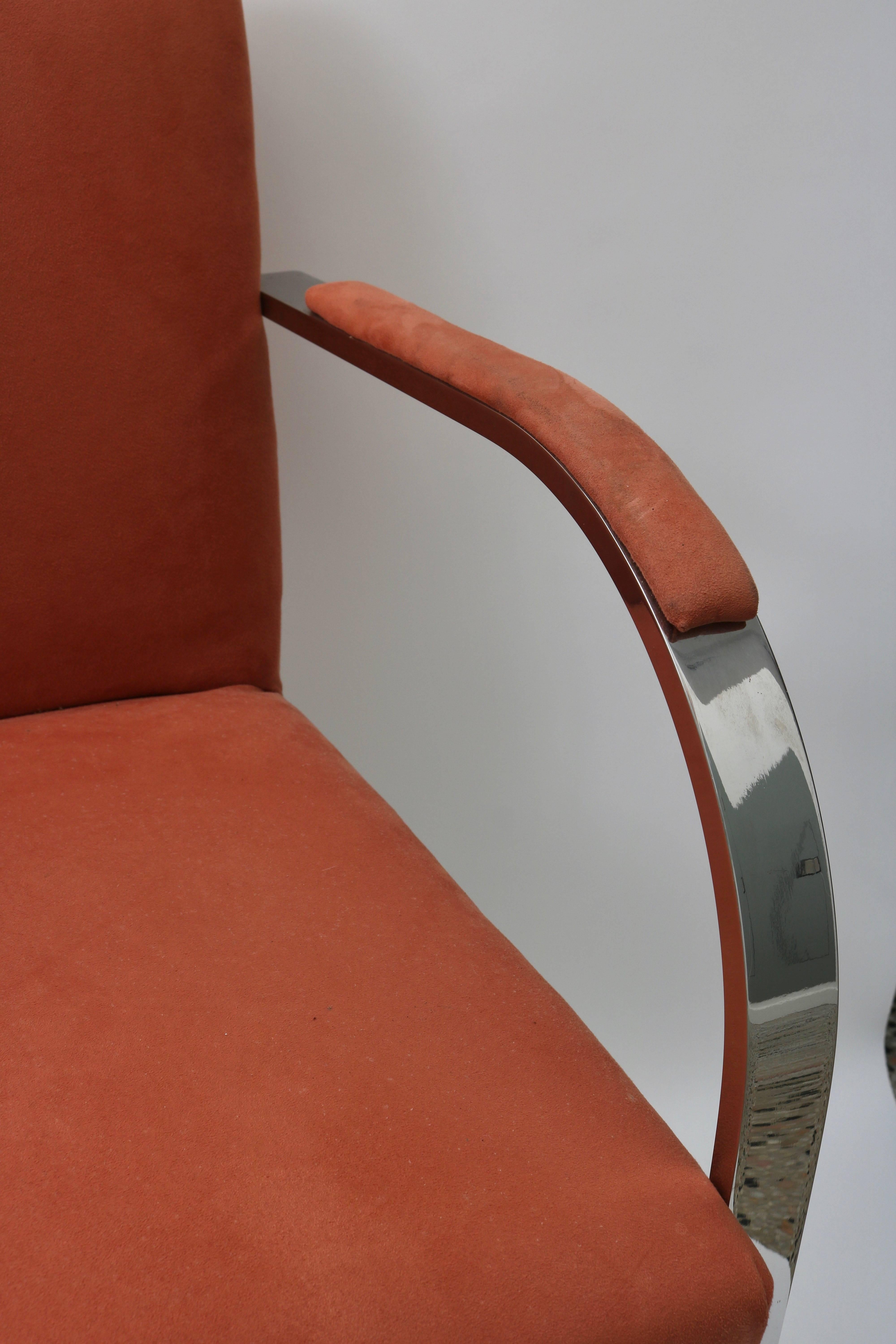 This set of six Brno chairs with their solid, polished steel frames date from the 1970s-1980s and are upholstered in a salmon colored ultra-suede fabric. The metal is in very good condition and the fabric does show wear.

Note: Arm height is 26.25
