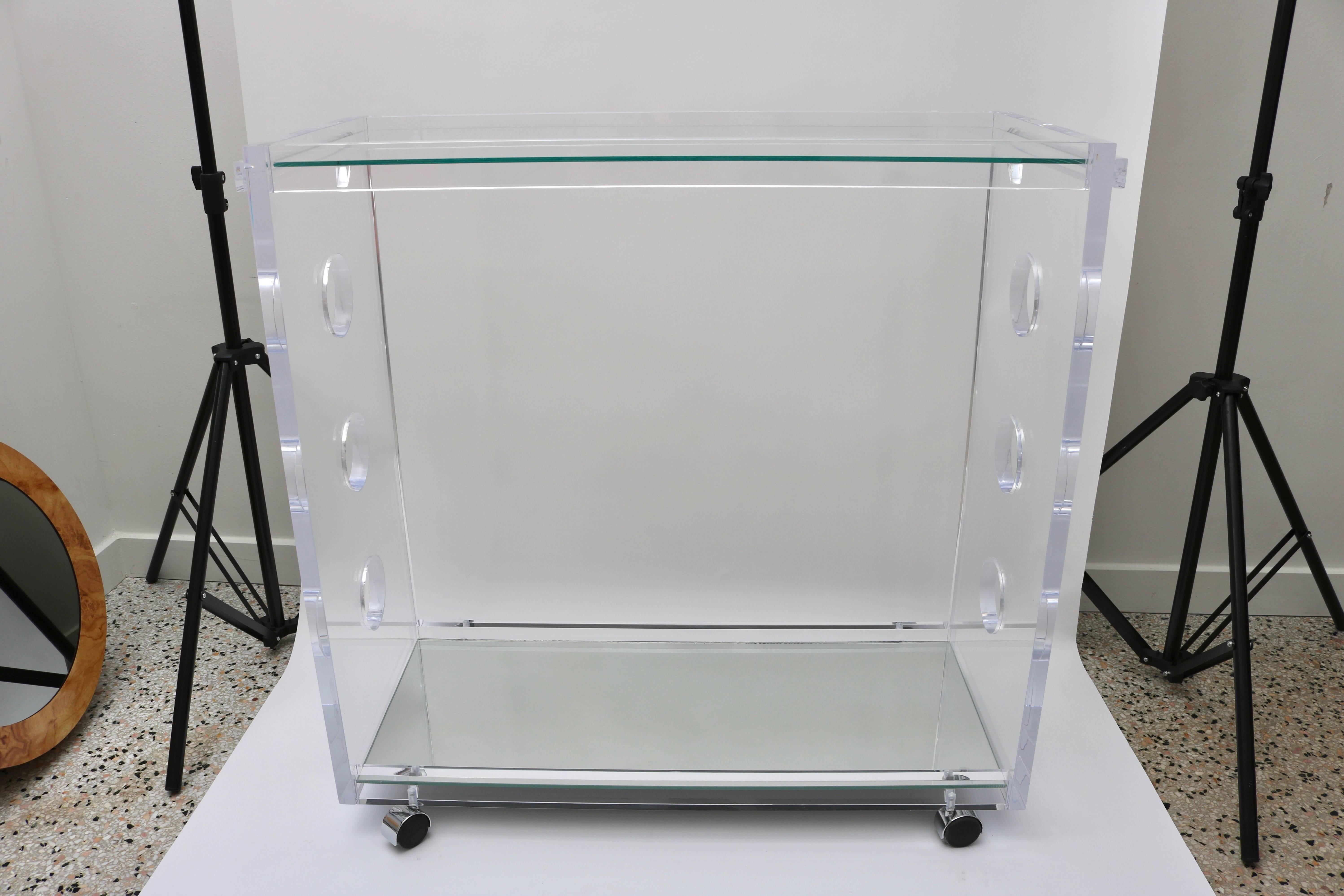 This bespoke Lucite bar cart was created by the firm of Alexander Millen and can be custom ordered to your specifications and of course purchased as shown.

For best net trade price or additional questions regarding this item, please click the