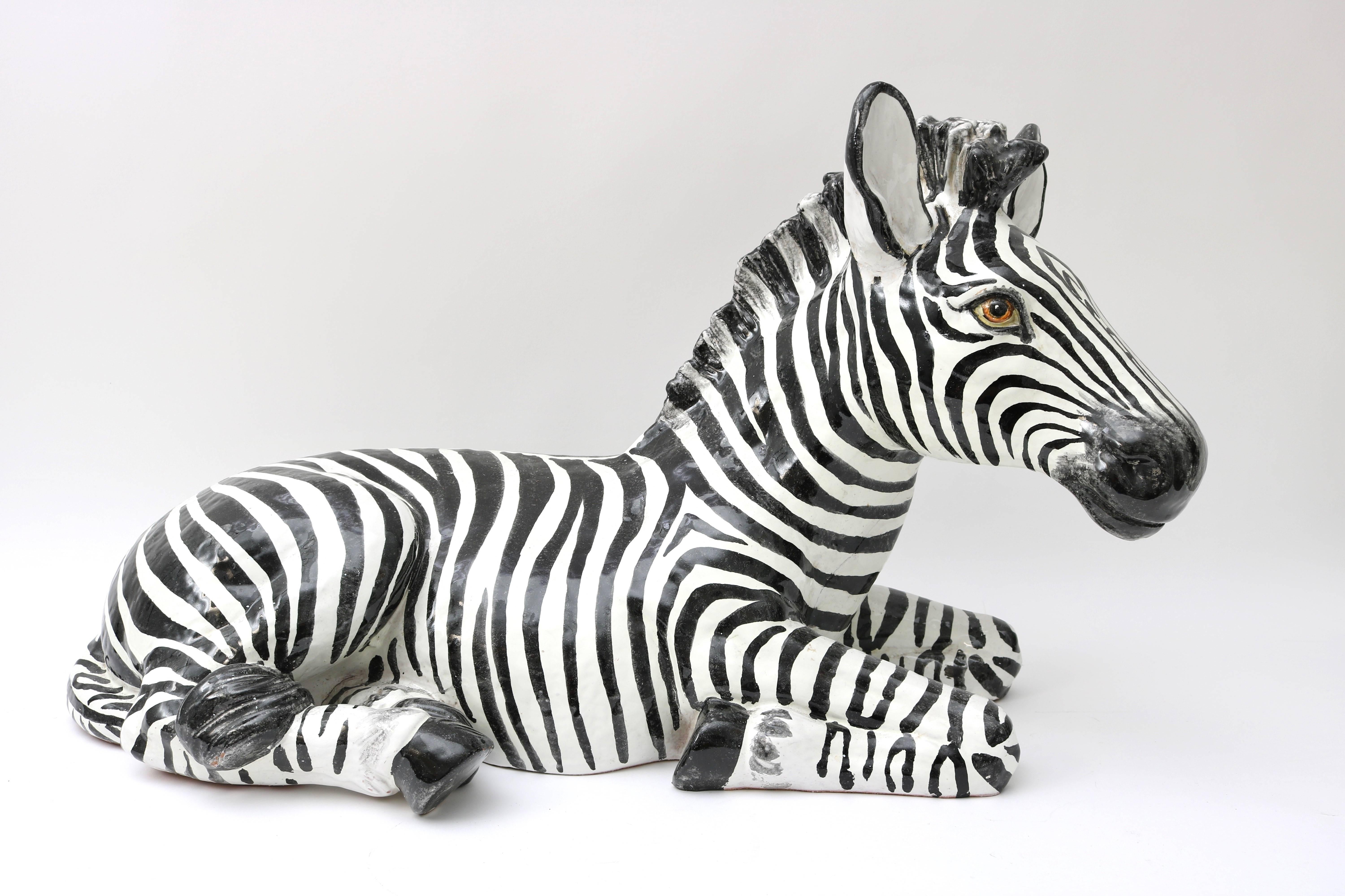 Recently acquired from a Palm Beach estate this zebra sculpture will make the perfect addition to your own Palm Beach Regency interior or garden pavilion.

For best net trade price or additional questions regarding this item, please click the
