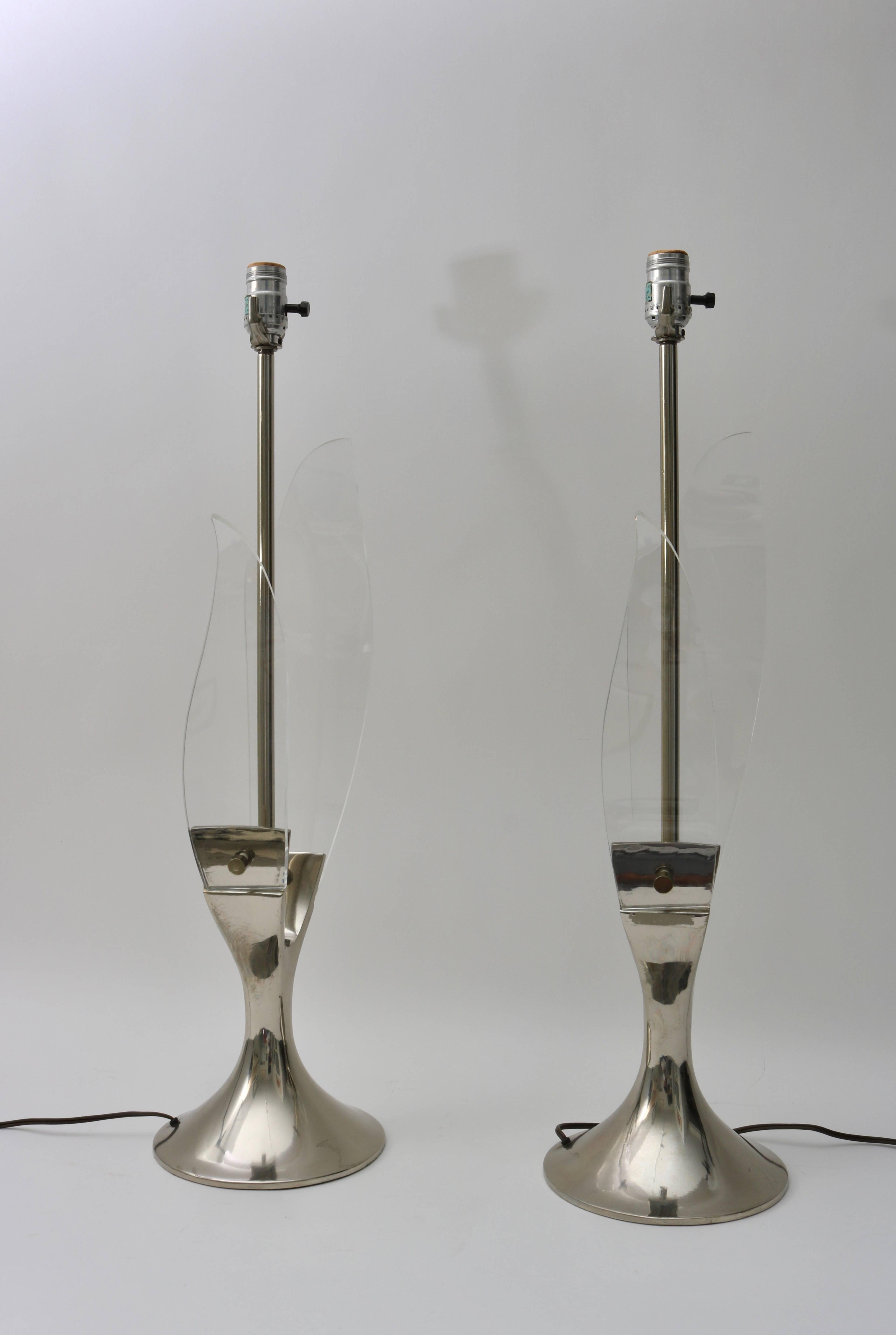 This stylish and chic pair of 1970s table lamps were created by the Laurel Lighting Comapany and are known as the 