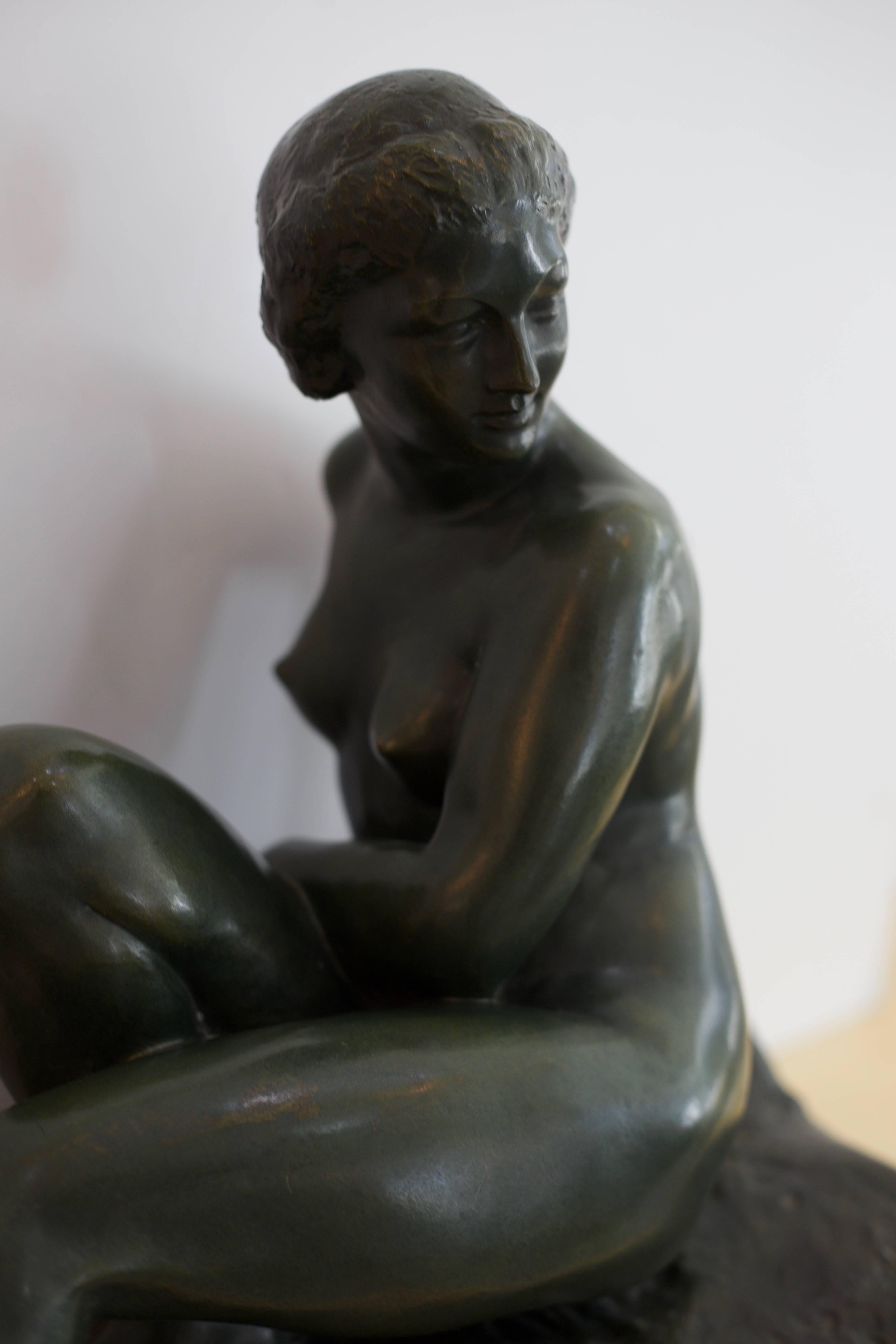 This stylish Art Deco bronze was recently acquired from a Palm Beach estate and dates to the 1920s-1930s. The sculptor Marcel Bouraine has captured the female form in a relaxed pose with a gentle gaze. 

Note: Foundry: L.N. Paris J.L.


 