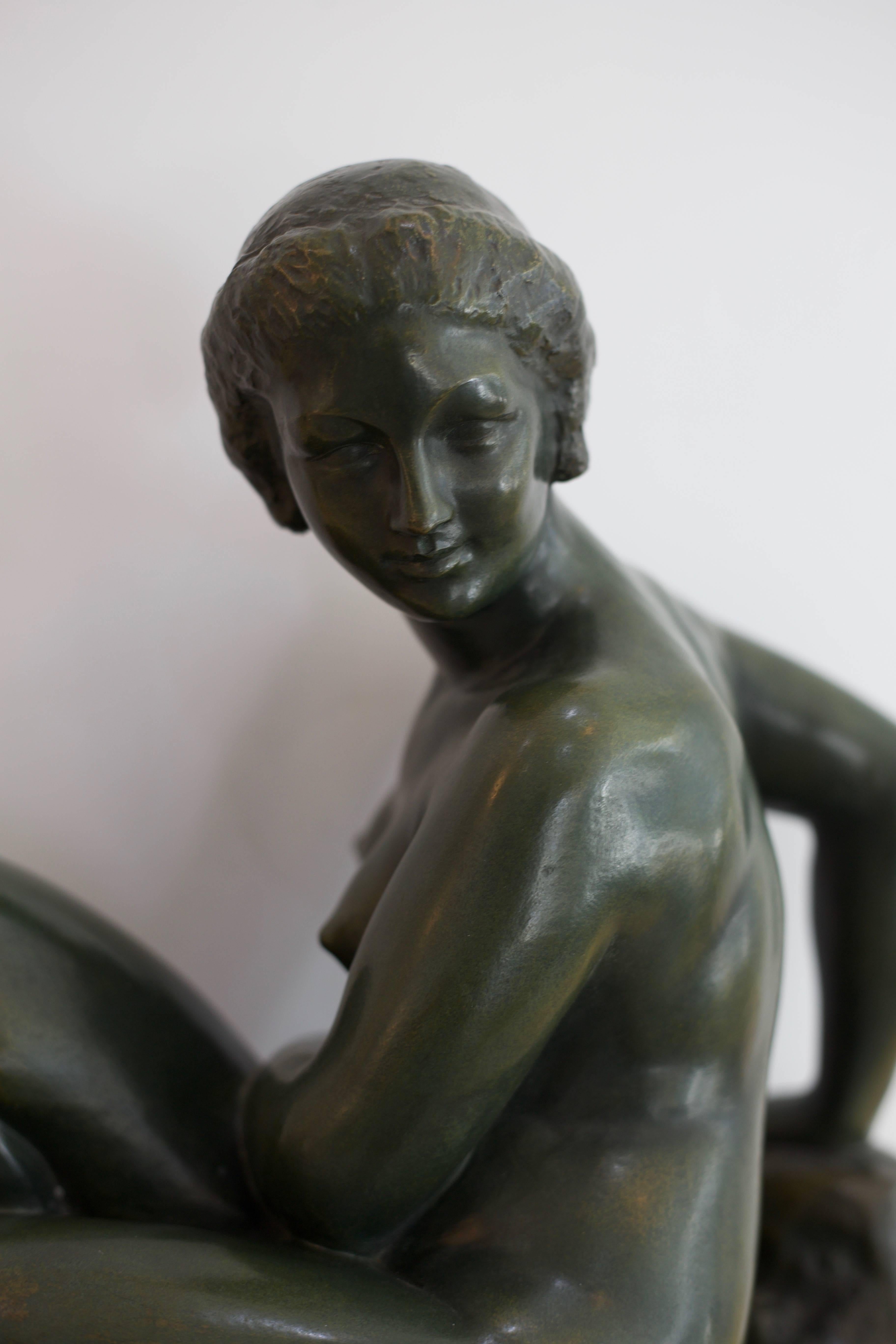 Cast  Bronze Sculpture of a Reclining Female Nude 