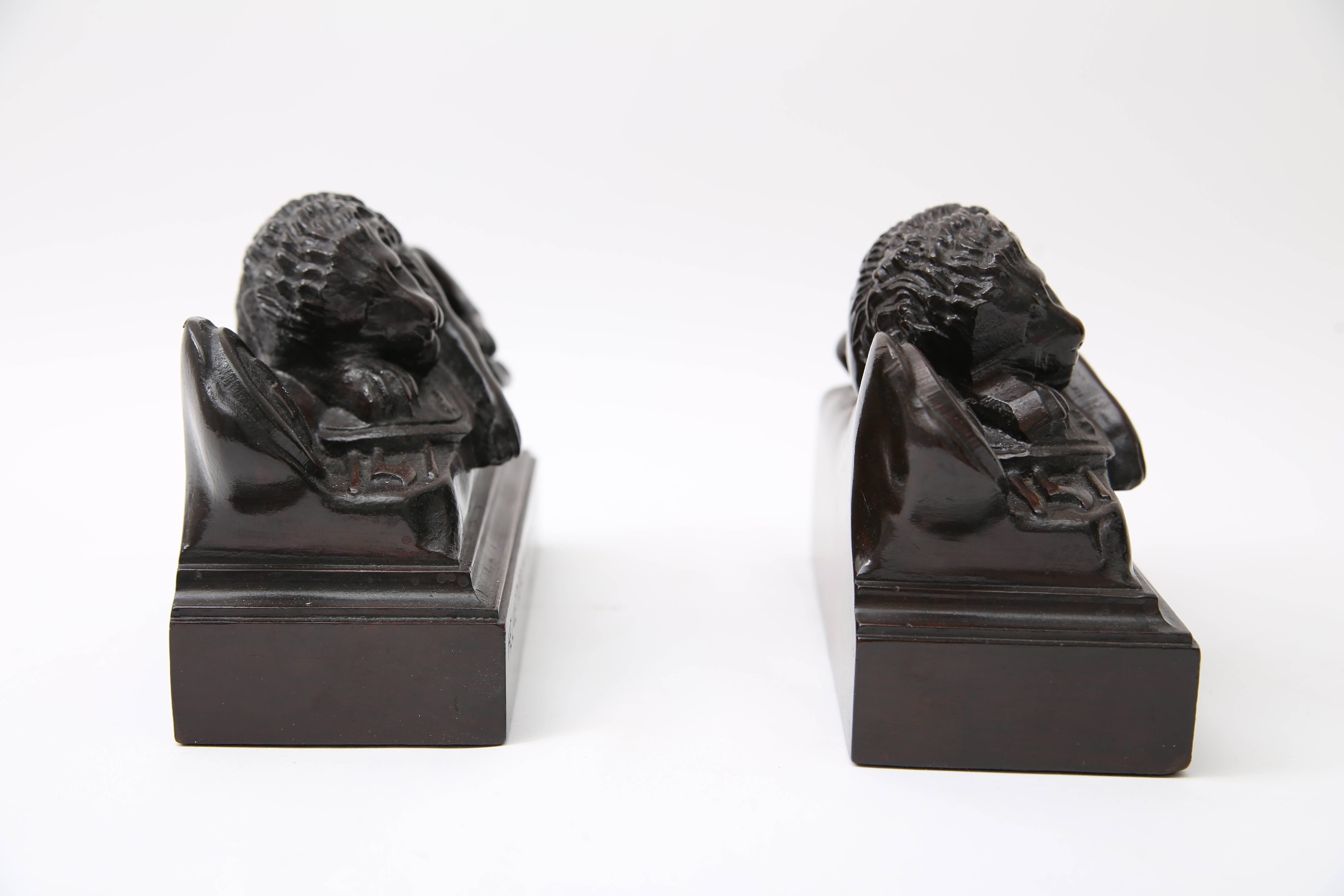 French Pair of Carved Wood Book Ends Depicting the Swiss Guard Lions of Lucerne, France
