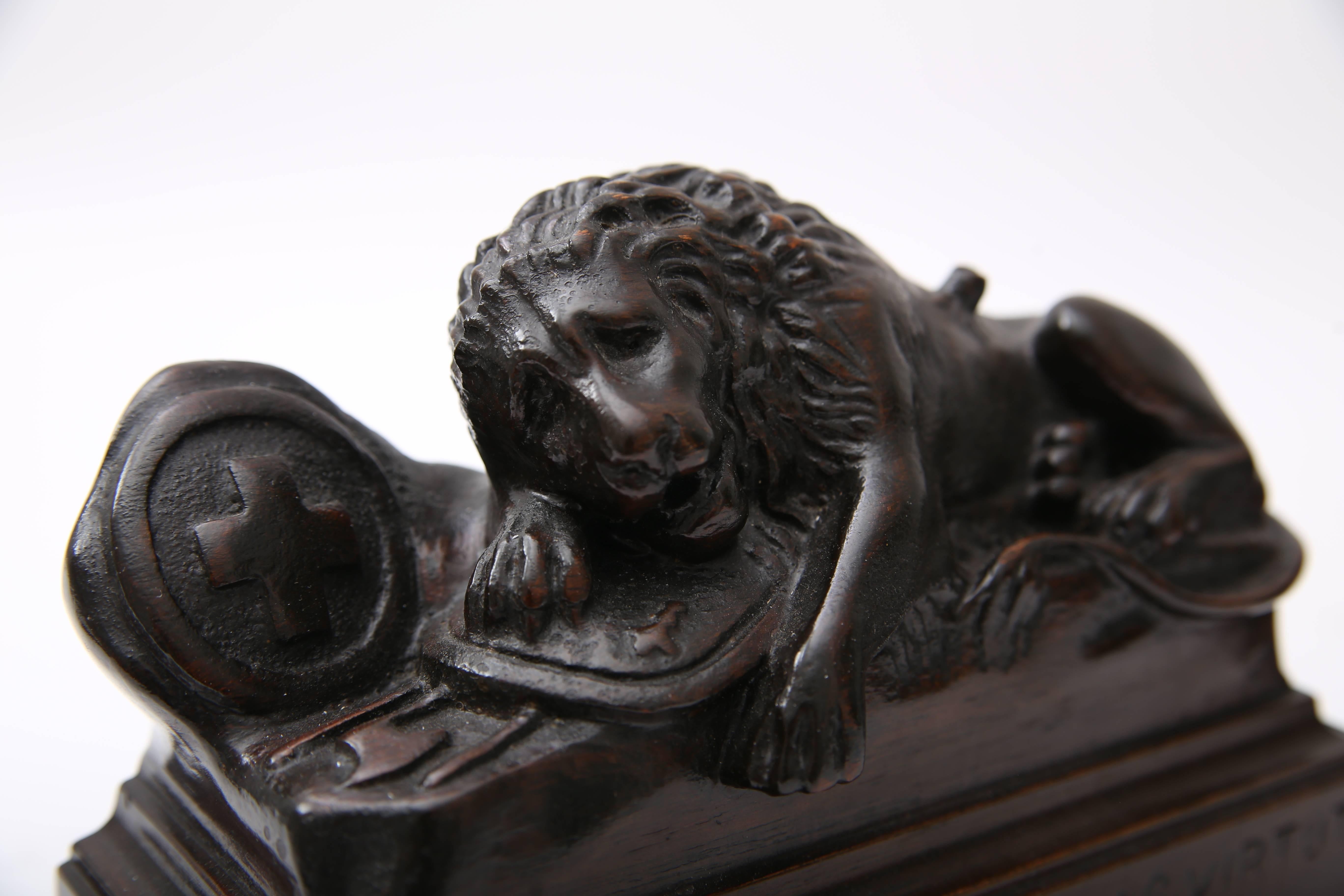 Hand-Carved Pair of Carved Wood Book Ends Depicting the Swiss Guard Lions of Lucerne, France