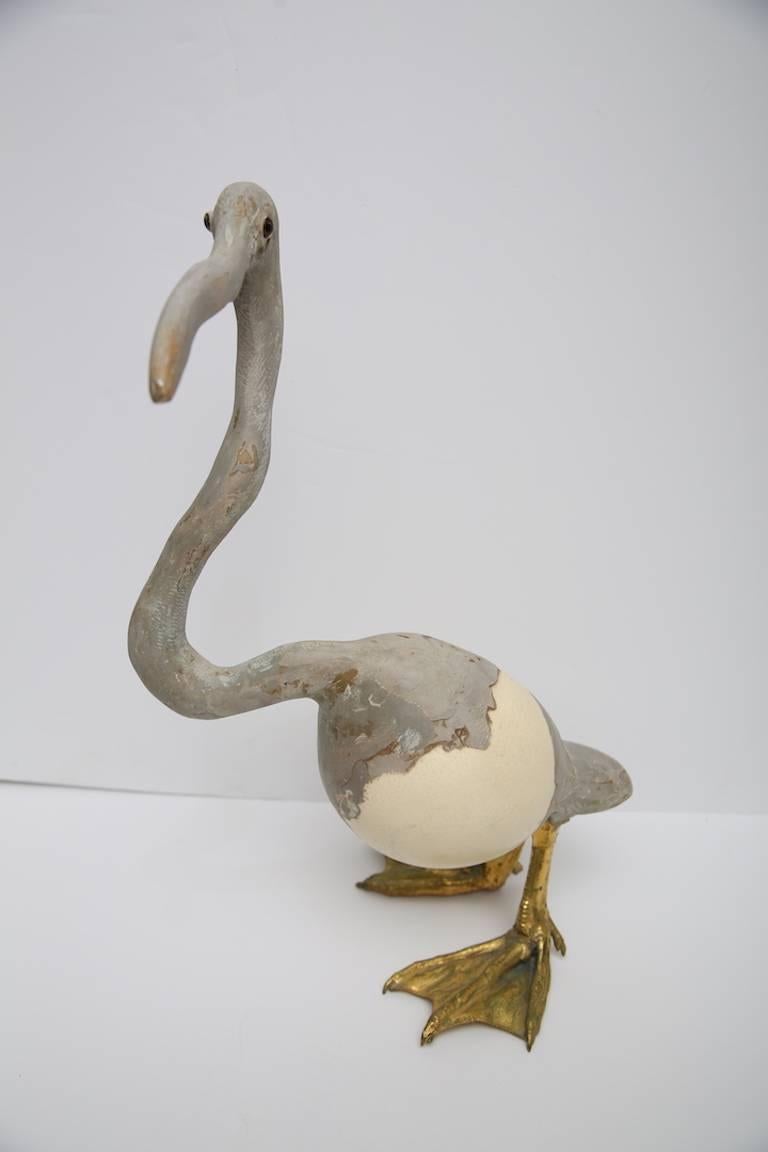 This stylish and organic piece was recently acquired from a Palm Beach estate and will make the perfect whimsical addition to your home. Here the artisan has captured a youthful Herron with its gangly stance and look of curiosity. The piece is