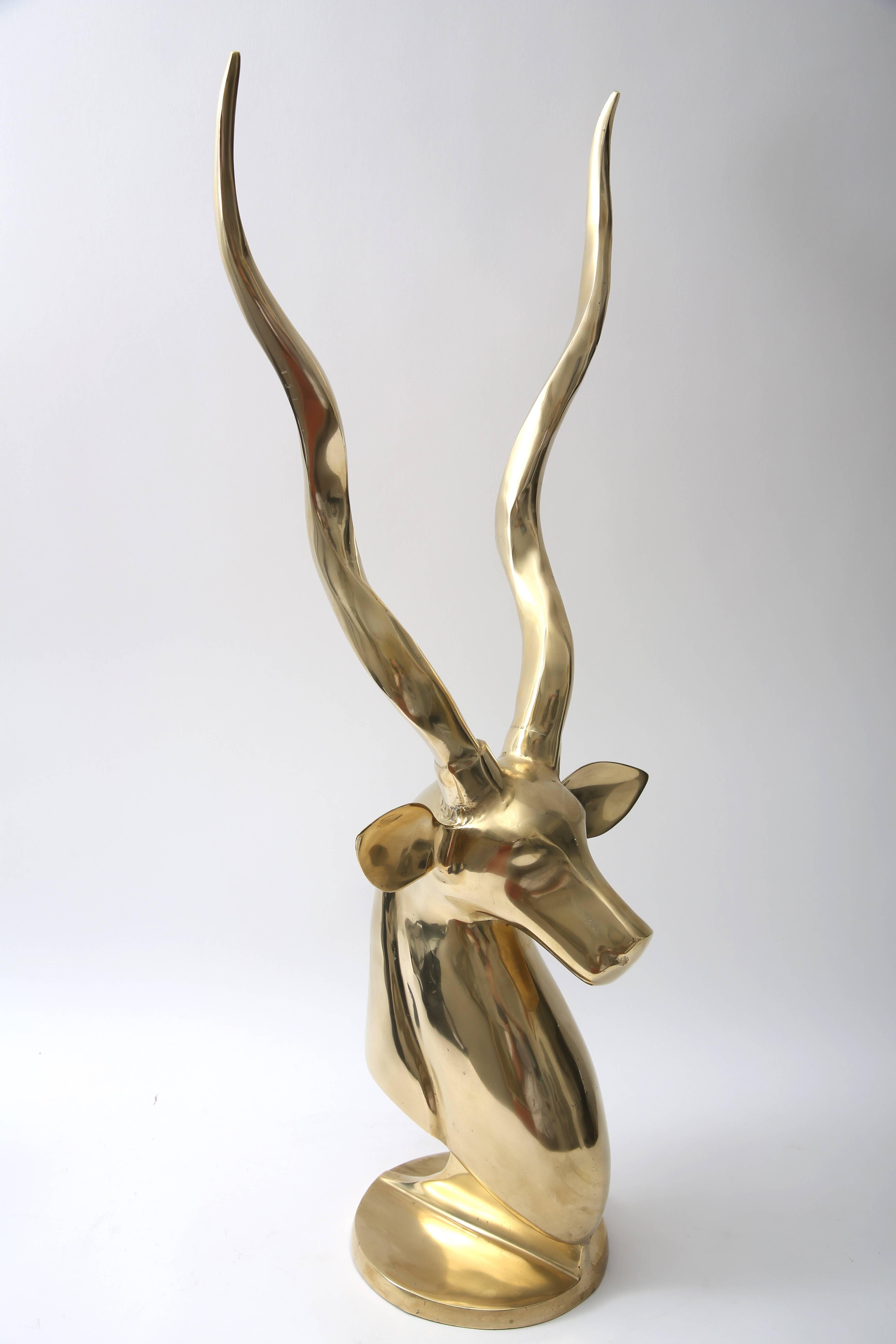 This stylish sculpture captures the exoticism and elegance of the Art Deco period with its stylized gazelle form and use of materials.

Note: Base measures 6.75