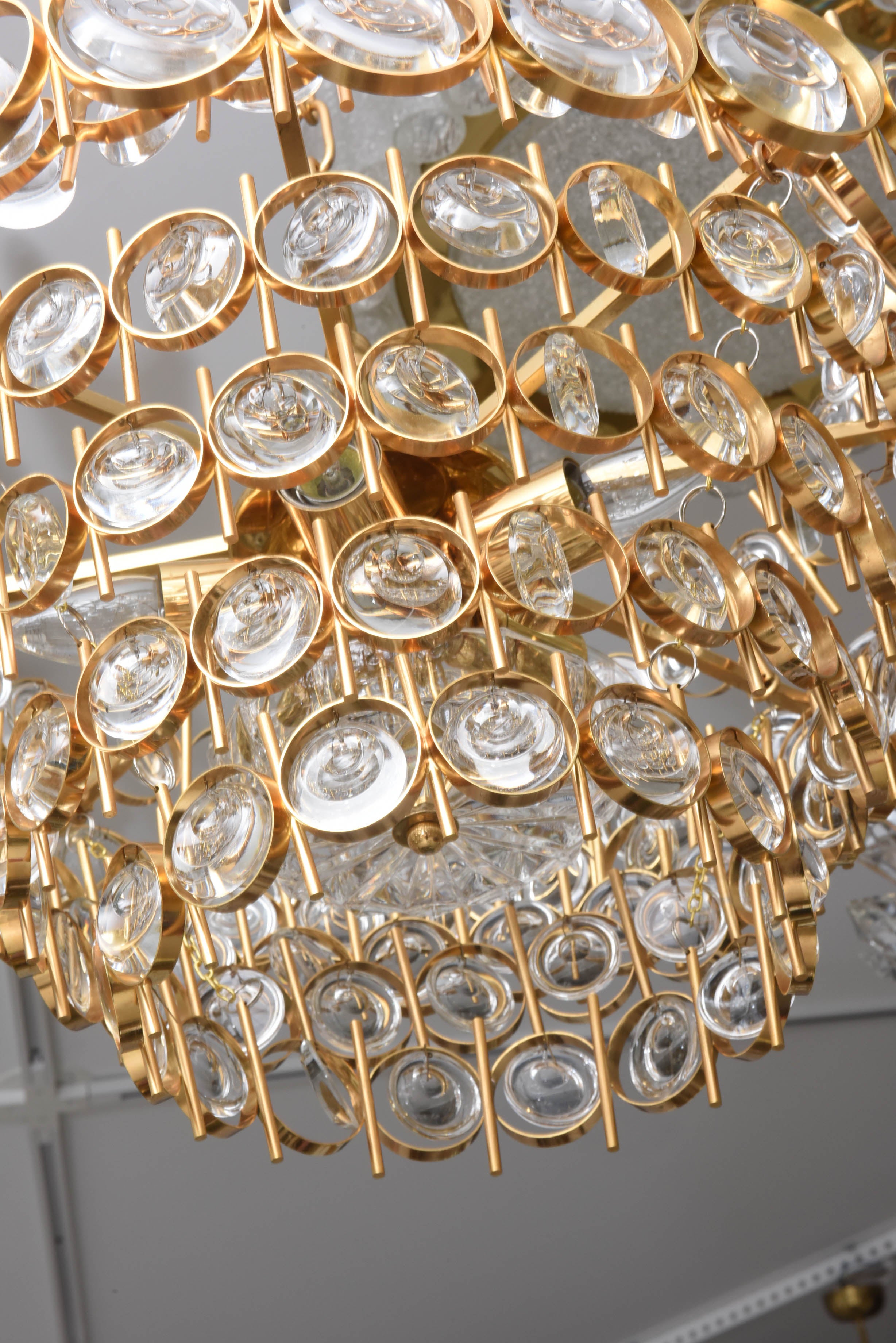 20th Century Hollywood Regency Style Polished Gold and Crystal Chandelier by Palwa