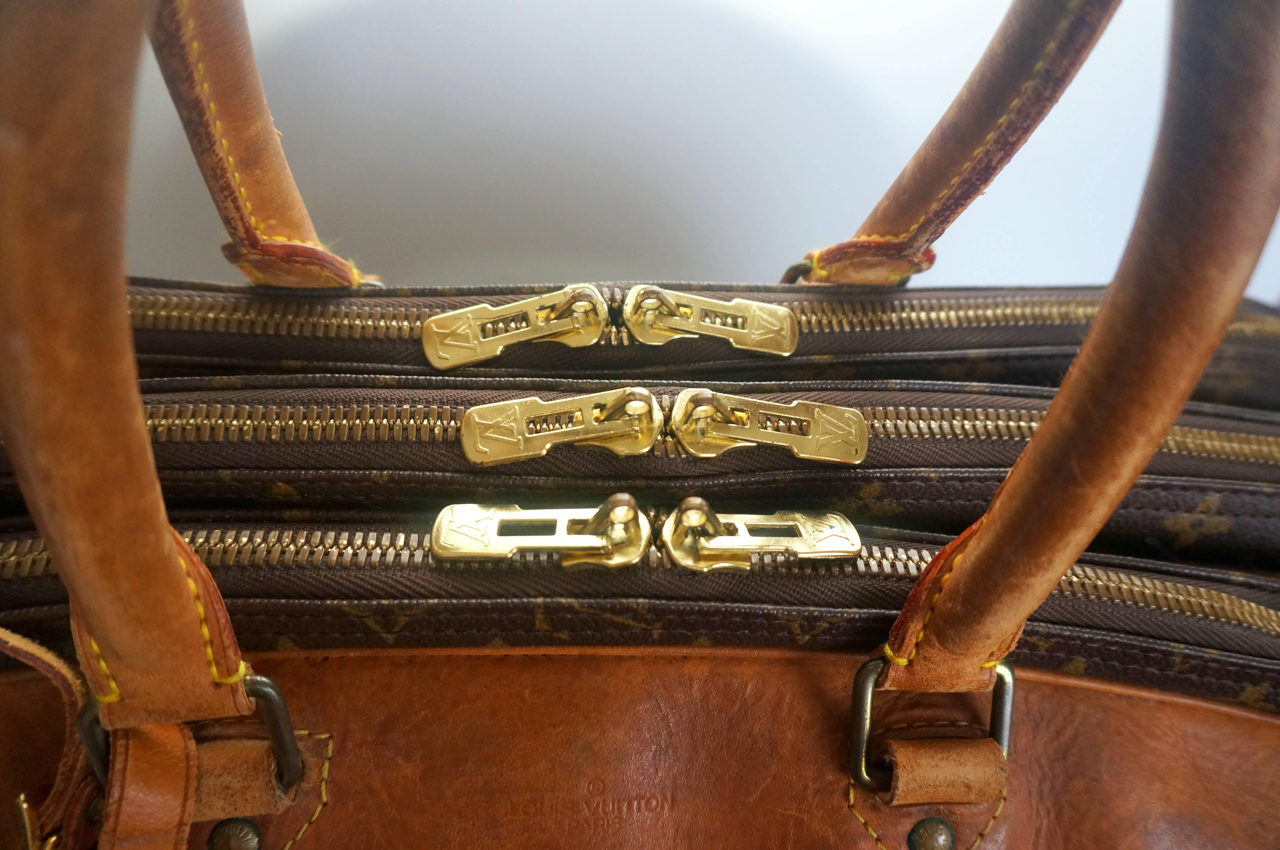 Modern  Louis Vuitton Weekender Bag with Iconic LV Monogram and Leather Trim