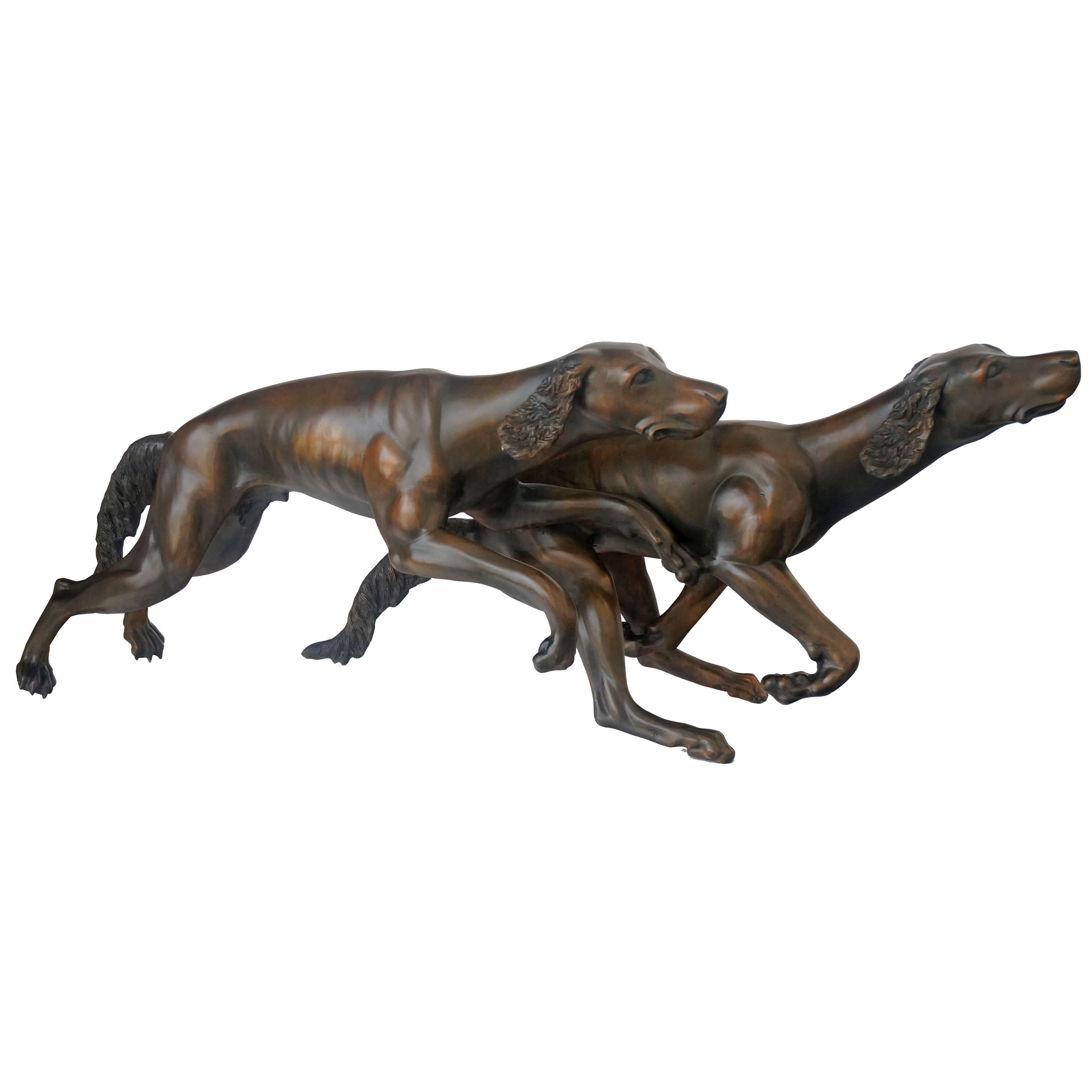This set of two cast-bronze lifesize Brittany spaniel sculptures will make the perfect addition to your garden or perhaps entrance. The sculptor has captured the Brittany in full range of motion as they seem to glide in unison across the imaginary