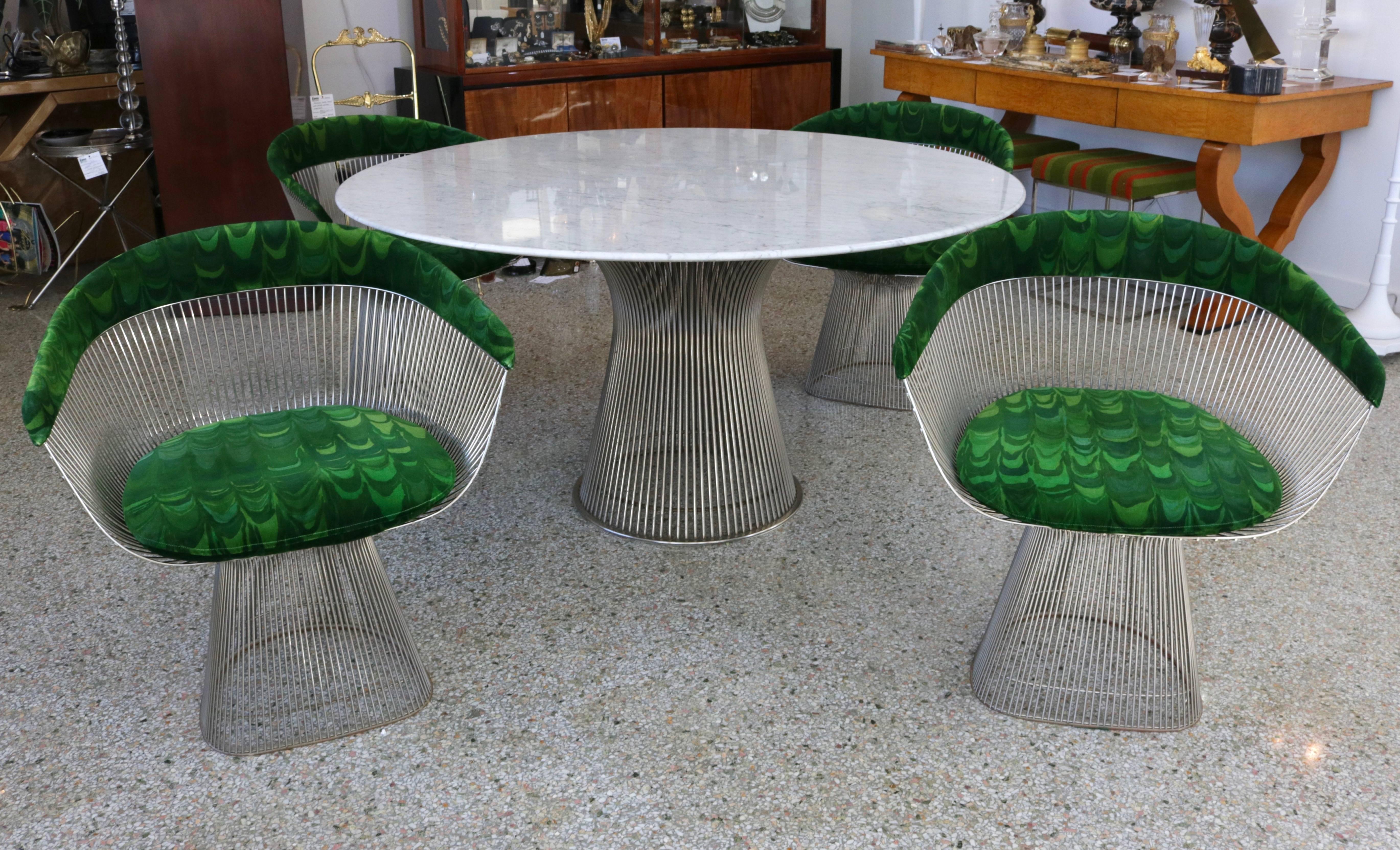 This set of table and chairs are by the iconic American designer Warren Platner and were produced by Knoll Furniture in 1971 and retain their original Jack Lenor Larsen velvet/velour fabric.  The marble is a soft grey and white and is no longer