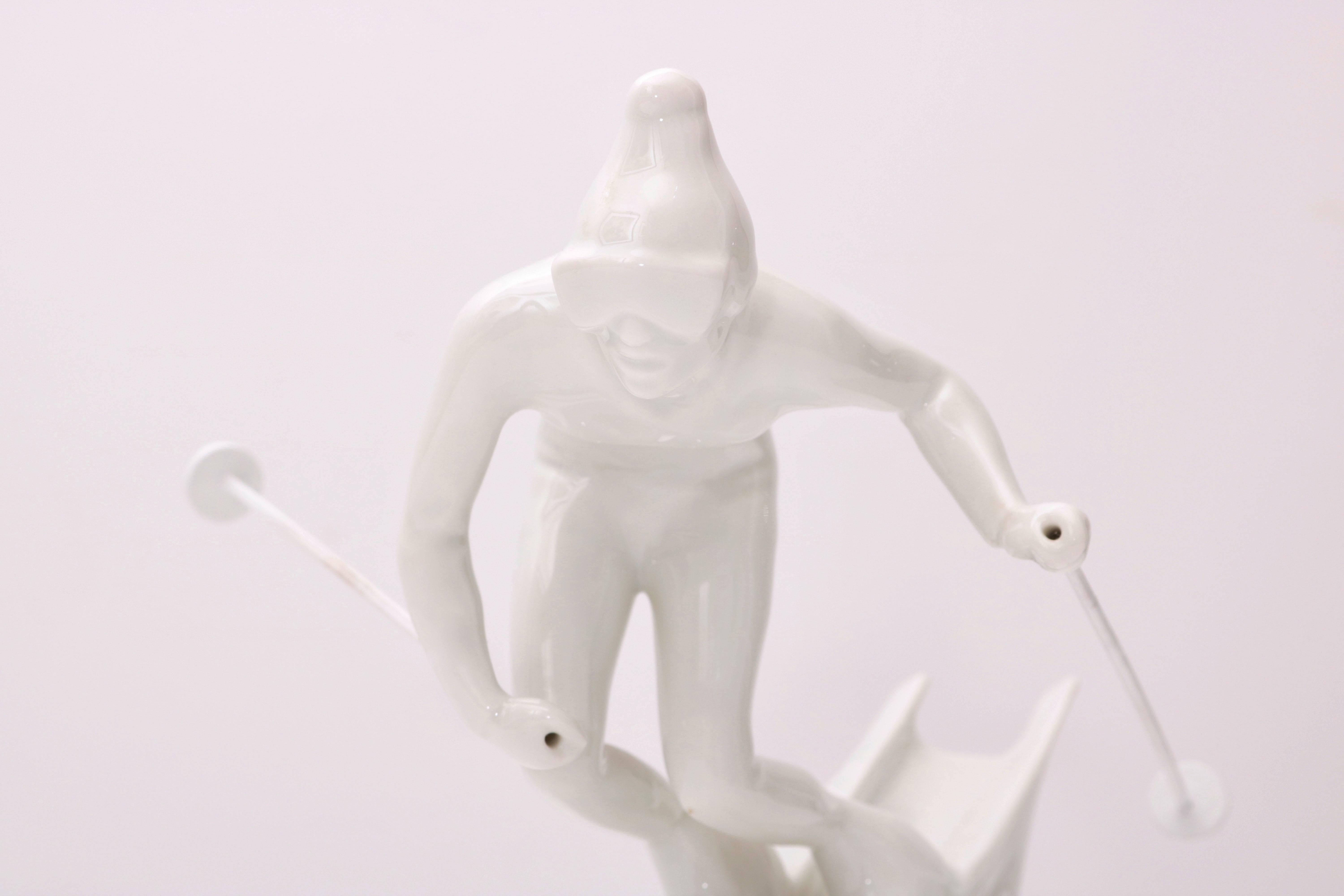 This stylish figure of a skier is by the iconic firm of Royal Dux and here they have captured the skier in pure form and movement in white porcelain.

Note: The poles are removable and made of wood and paper.

For best net trade price or