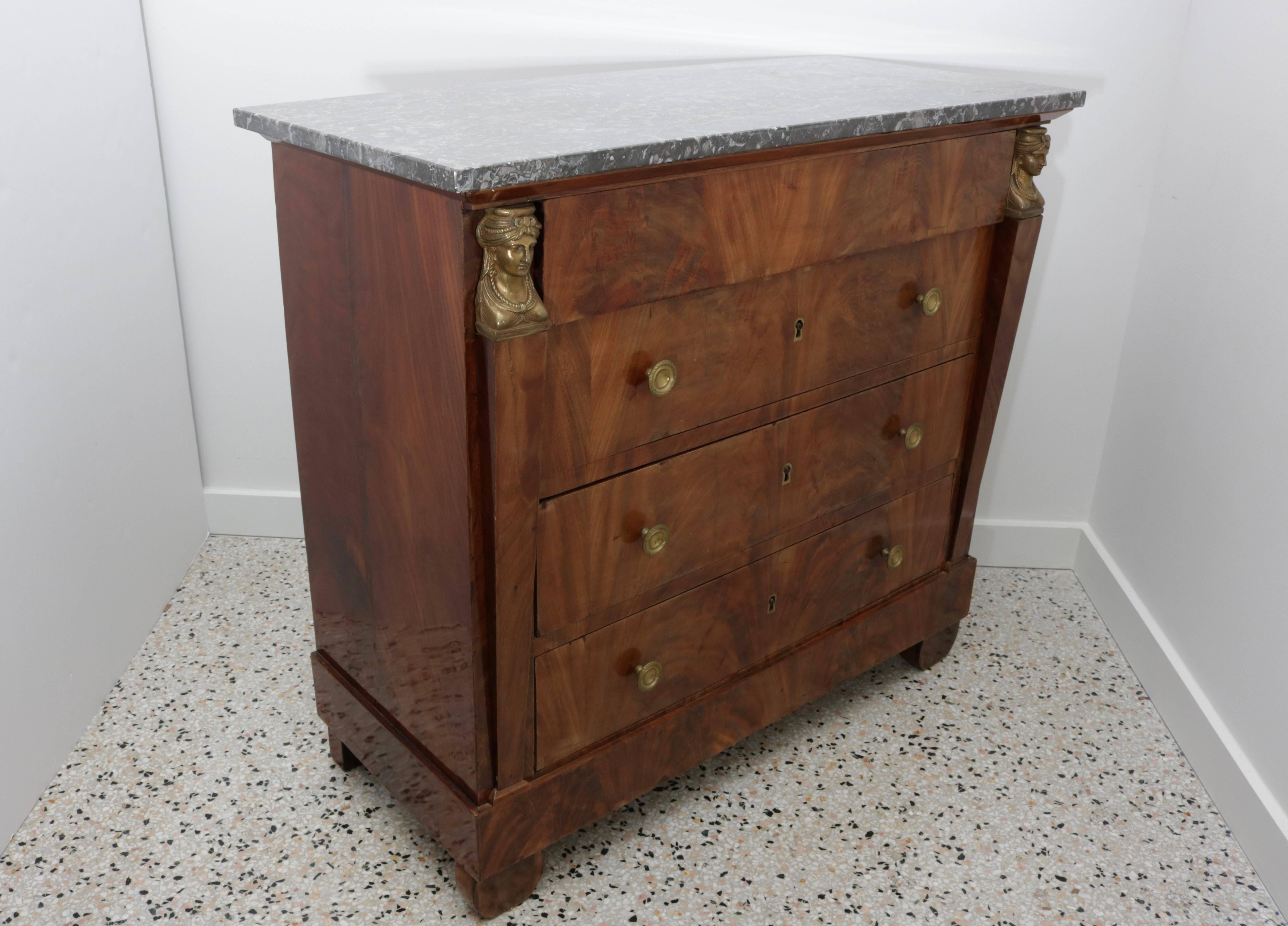 This handsome four-drawer French Empire chest was recently purchased in London and will make the perfect piece for one’s bedroom, library or perhaps foyer. The mahogany wood has a 