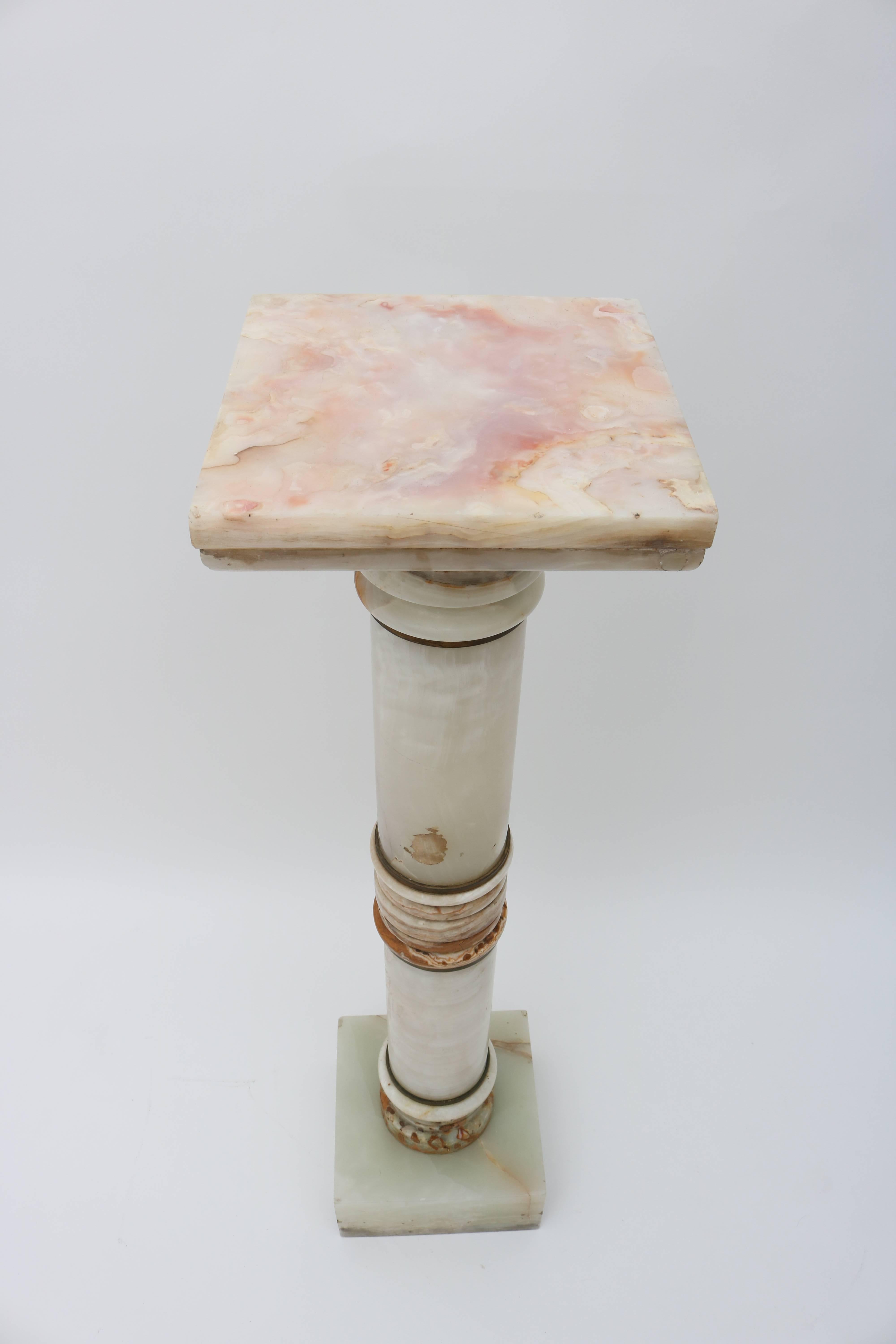 This onyx and bronze pedestal will work beautifully to display a classical bronze or perhaps a potted orchid.

Note: Bronze has aged to an antique finish.

For best net trade price or additional questions regarding this item, please click the