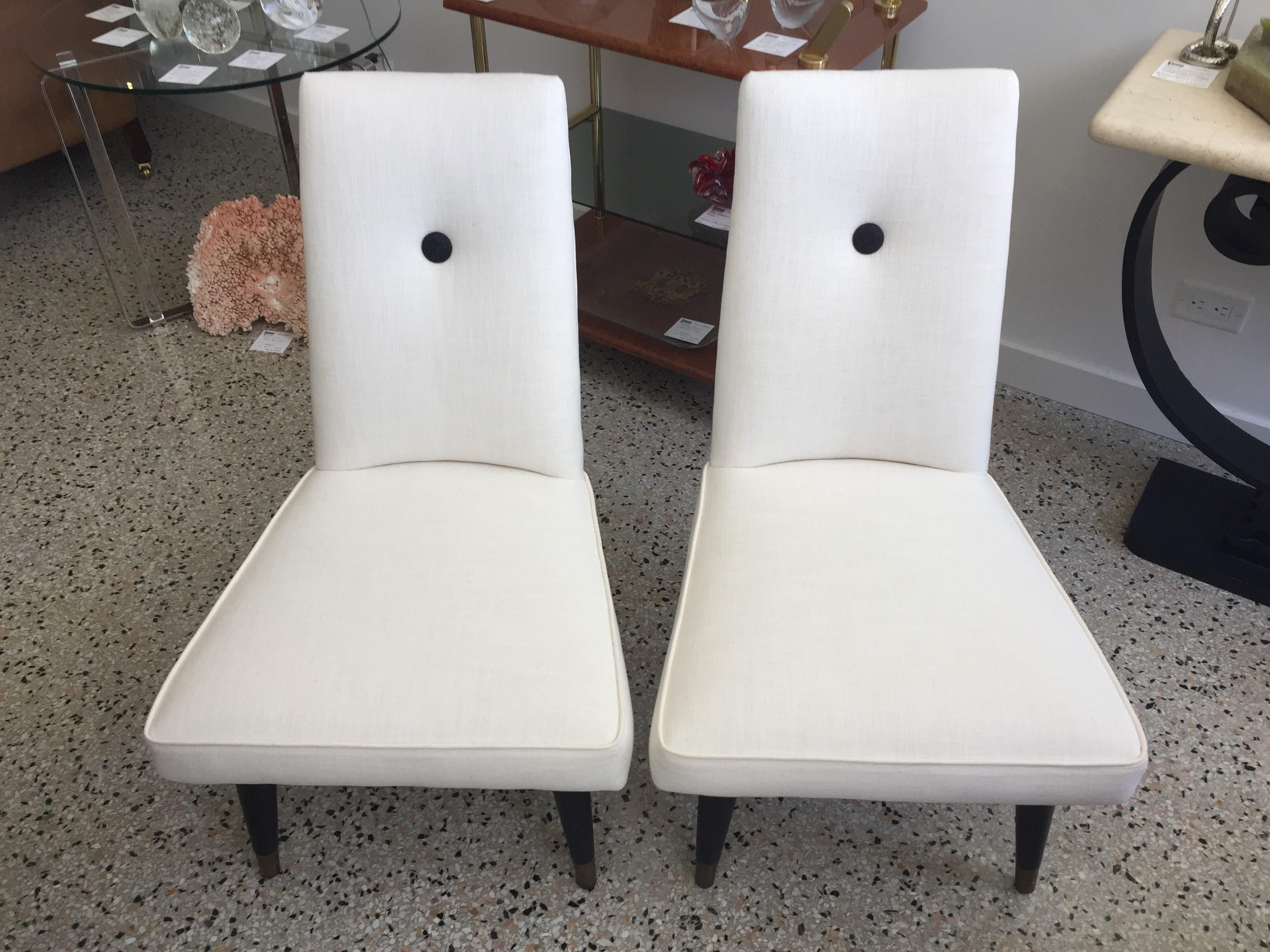 This pair of Mid-Century slipper chairs were purchased in Italy and have been professionally restored. The upholstery fabric is a woven texture in a soft white and black.

For best net trade price or additional questions regarding this item, please
