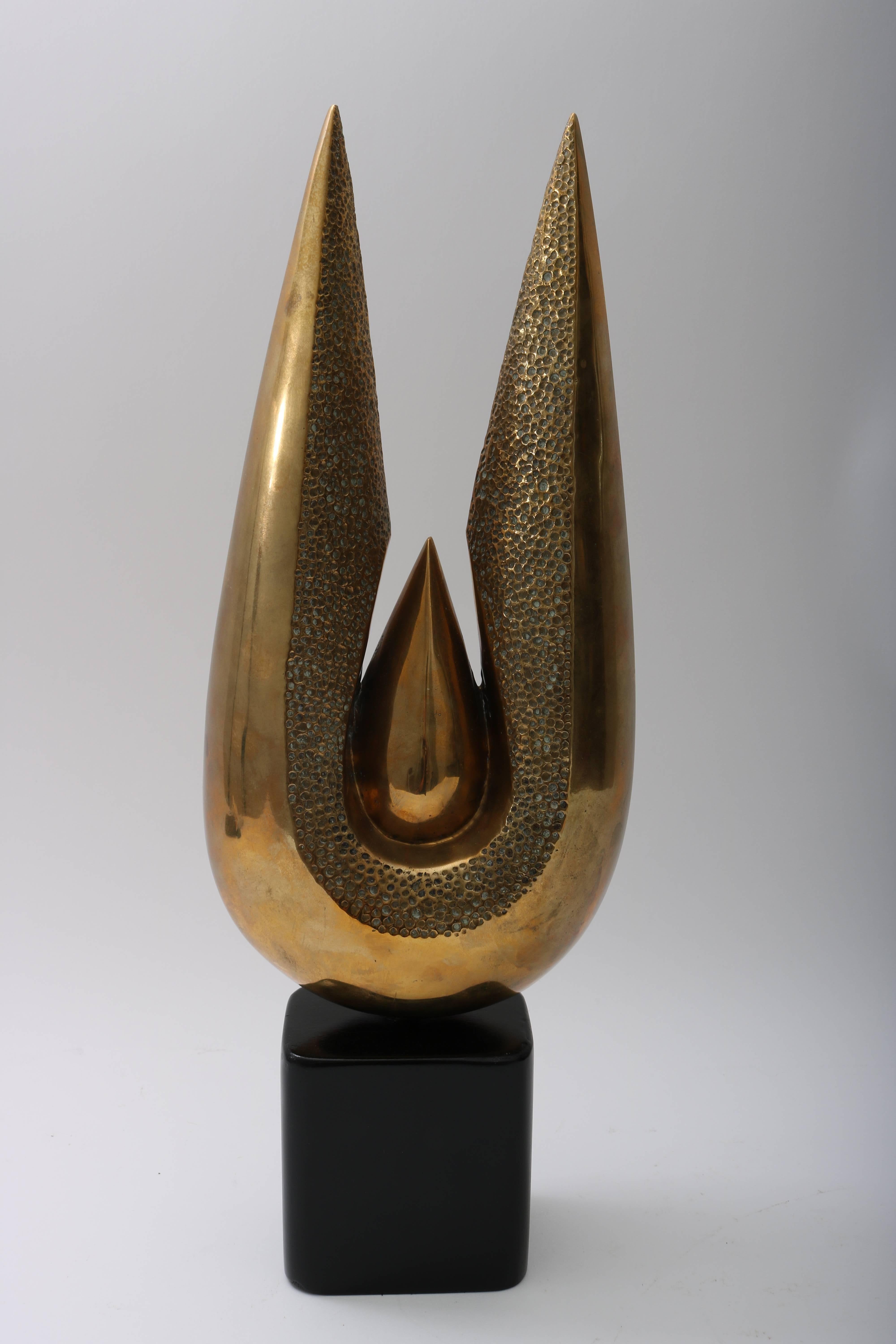 This stylish bronze piece dates to the mid-20th century and was created in Thailand. The organic, stylized form is quite modern and will make a great addition to your home.

Note: Piece is signed and numbered. SURAWONGSE 3/1000.

 