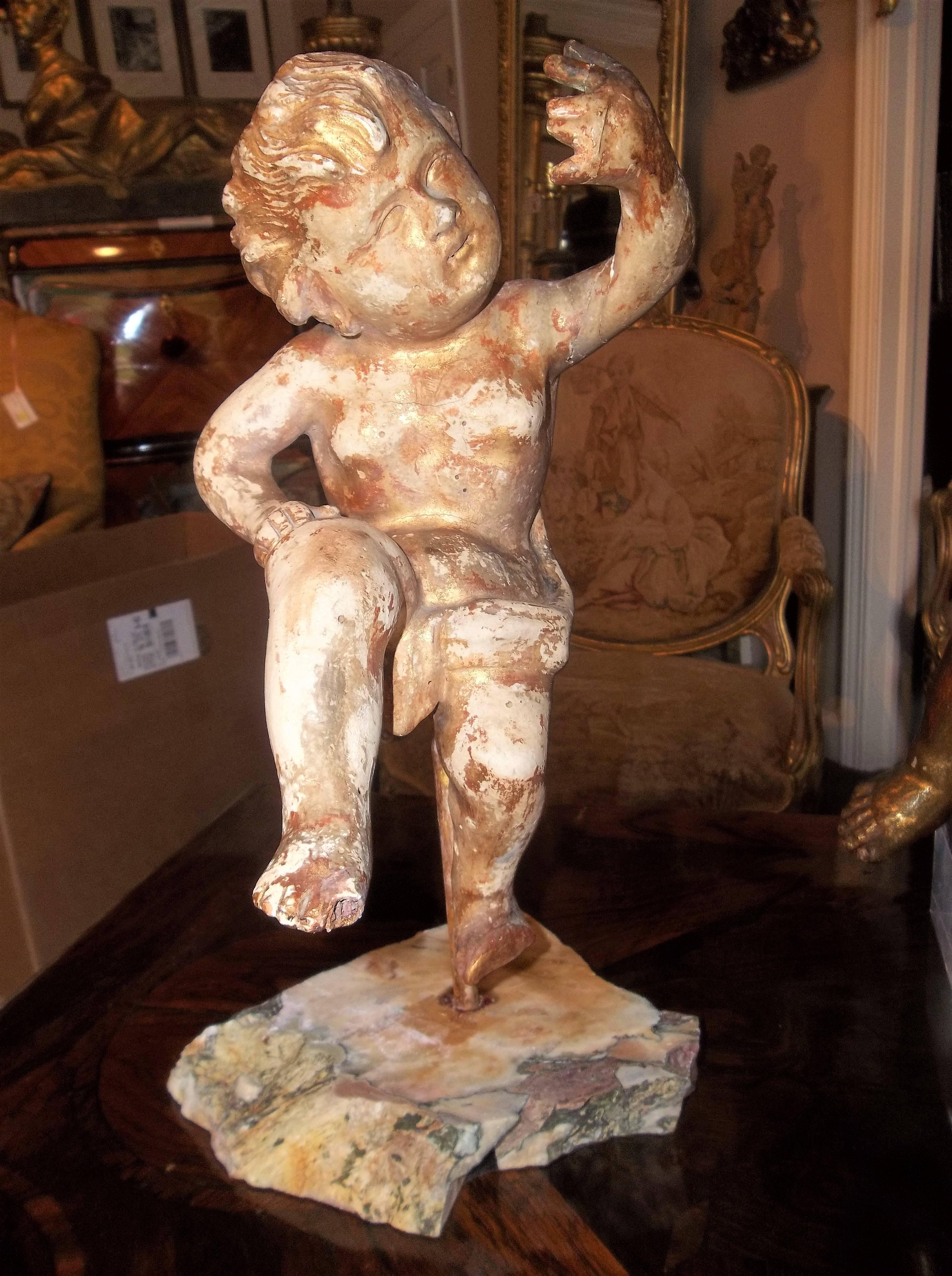 Baroque Pair of Carved and Giltwood Cherubs or Putti on Stand