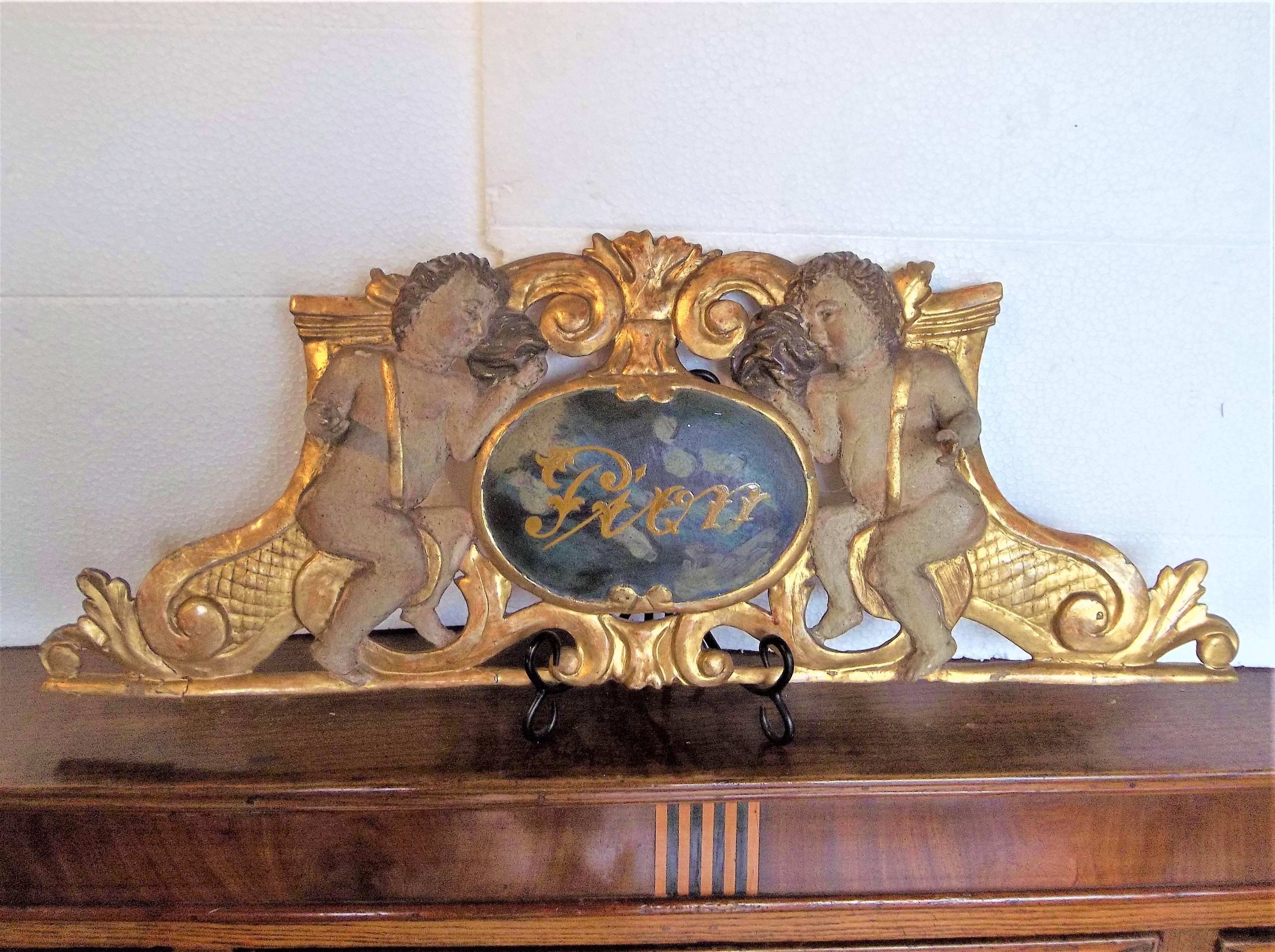 20th Century Giltwood and Painted Overdoor Panel Fragment with Cherub Motif
