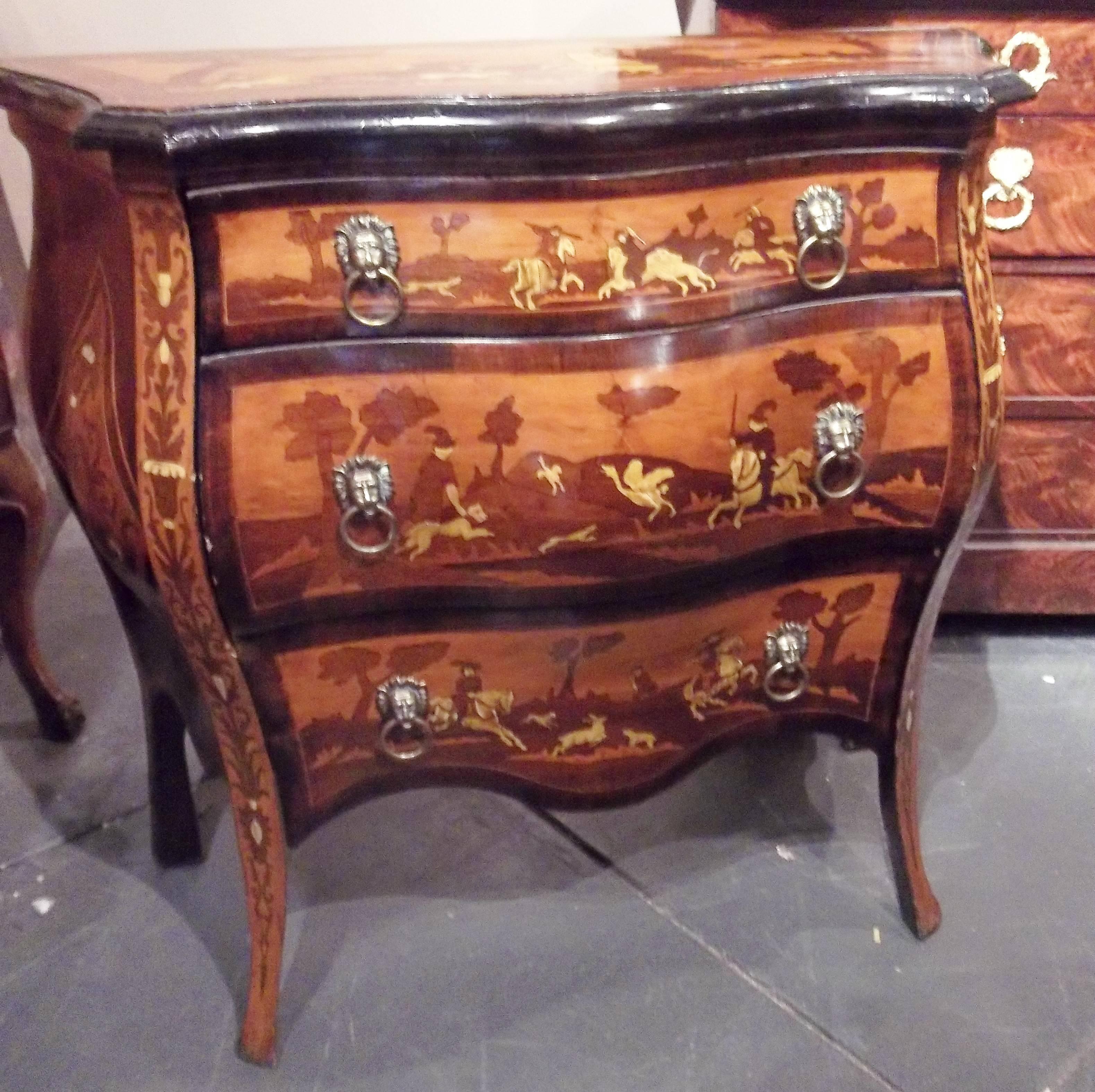Top and three drawers in a hunt scene marquetry with bone inlay. The sides in a floral inlaid diamond. Some ebonized trim. Probably Austria due to the pronounced Rococo bombe form. A Grand Tour equivalent of a black forest furniture souvenir. 

Very