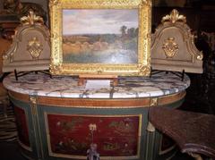 Pair of Paint and Parcel Gilt Overdoors