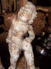 Pair of Carved and Giltwood Cherubs or Putti on Stand