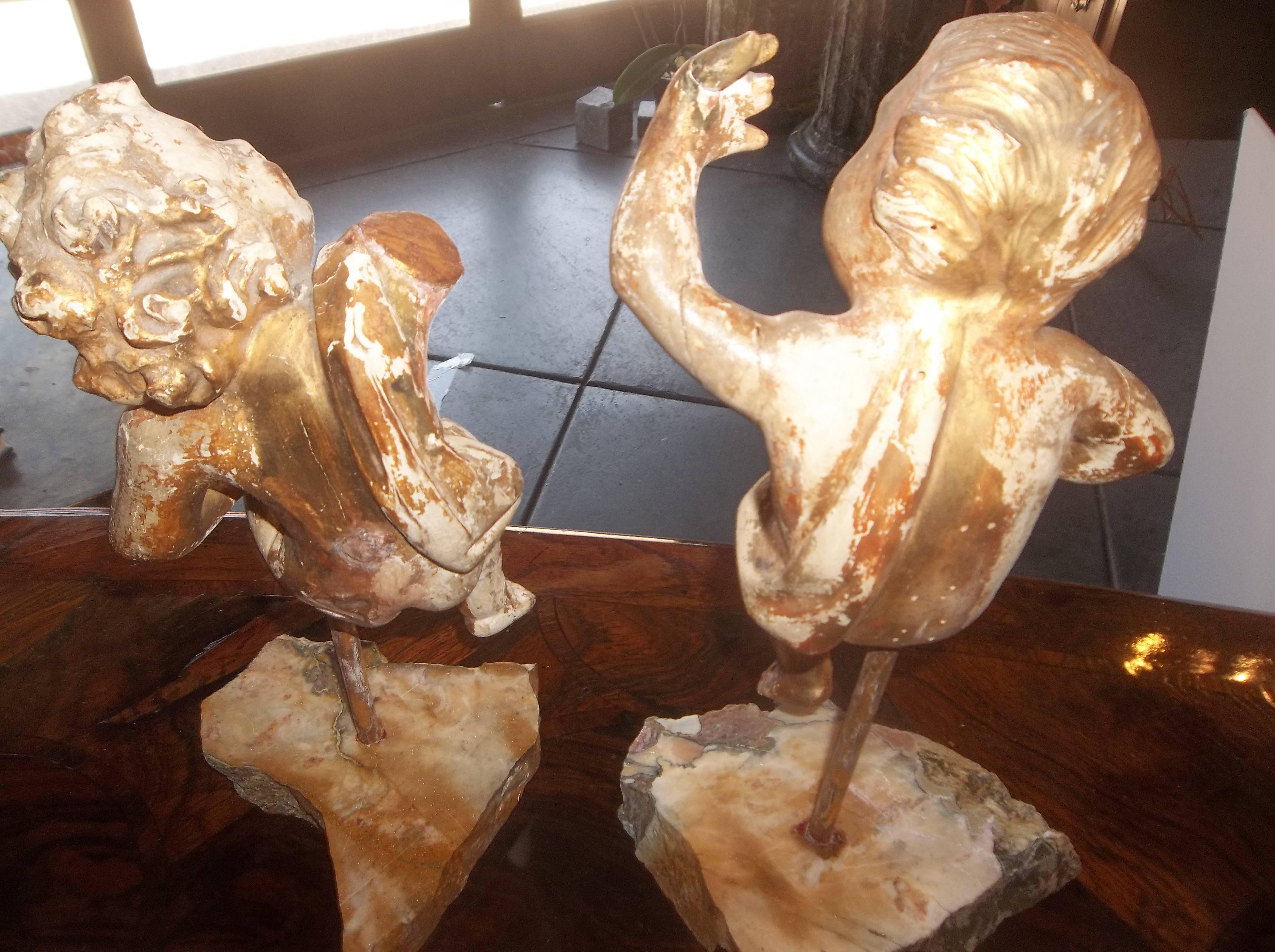 Pair of Carved and Giltwood Cherubs or Putti on Stand In Distressed Condition In Nashville, TN