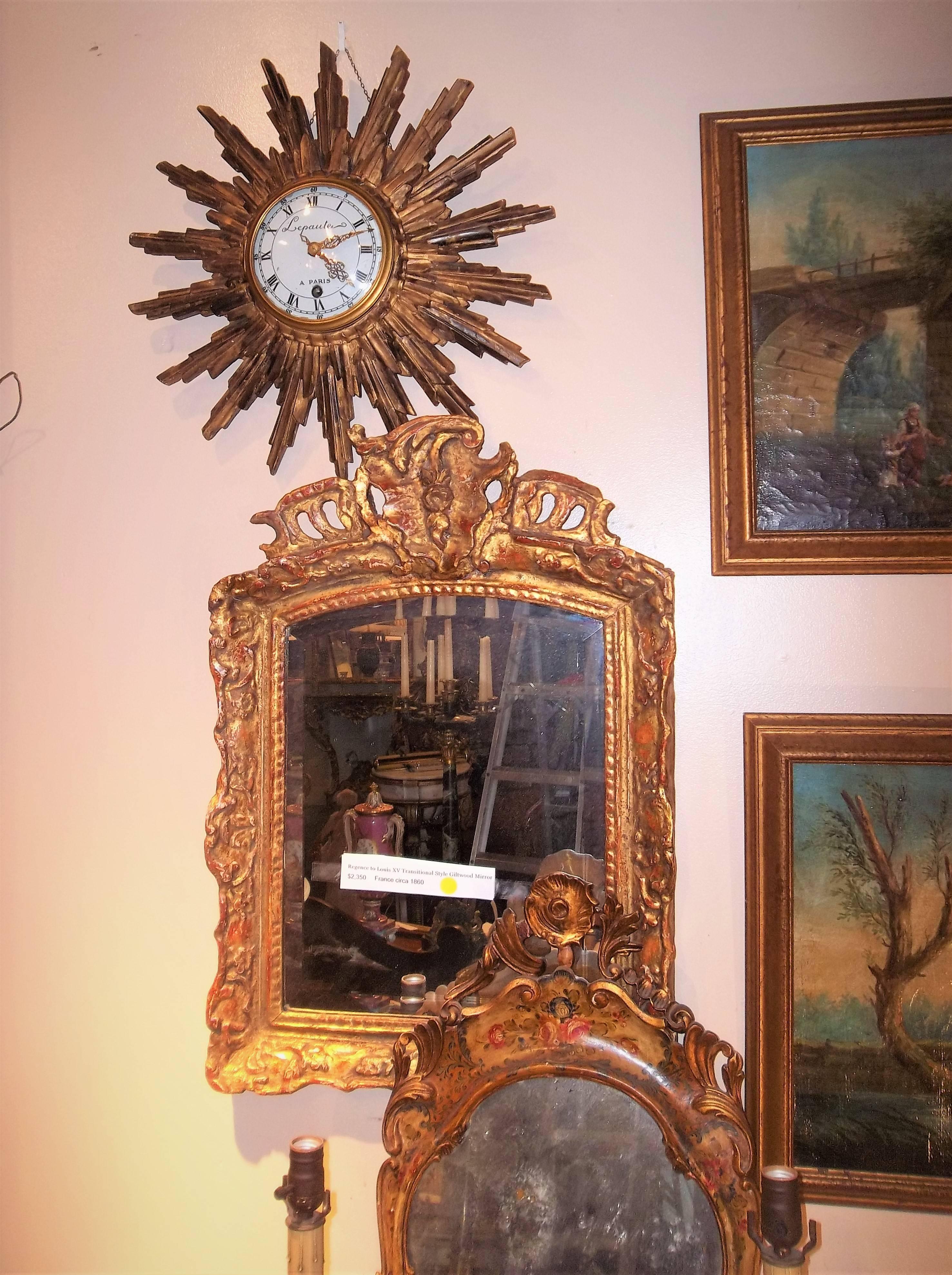 Carved Giltwood Sunburst with Clock Signed Lepaute a Paris In Good Condition In Nashville, TN