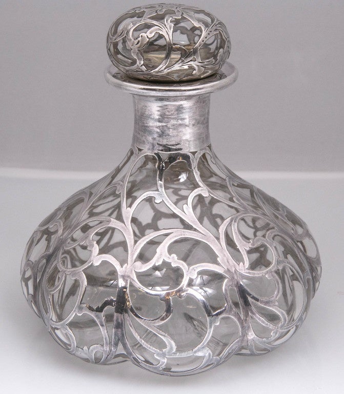 This is just one of 350 pieces of a large collection of small 18th-early 19th century antiques from a private collection.
This is a sterling silver overlay perfume bottle dated 1890. Made by Gorham.
Approximately 6 inches in height, with eight