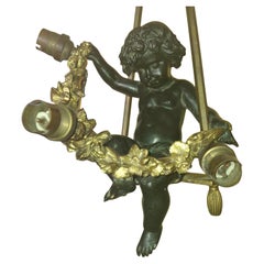 19. Jahrhundert Französisch Louis XV vergoldet und patiniert große Bronze Cherub auf einer Schaukel Kronleuchter