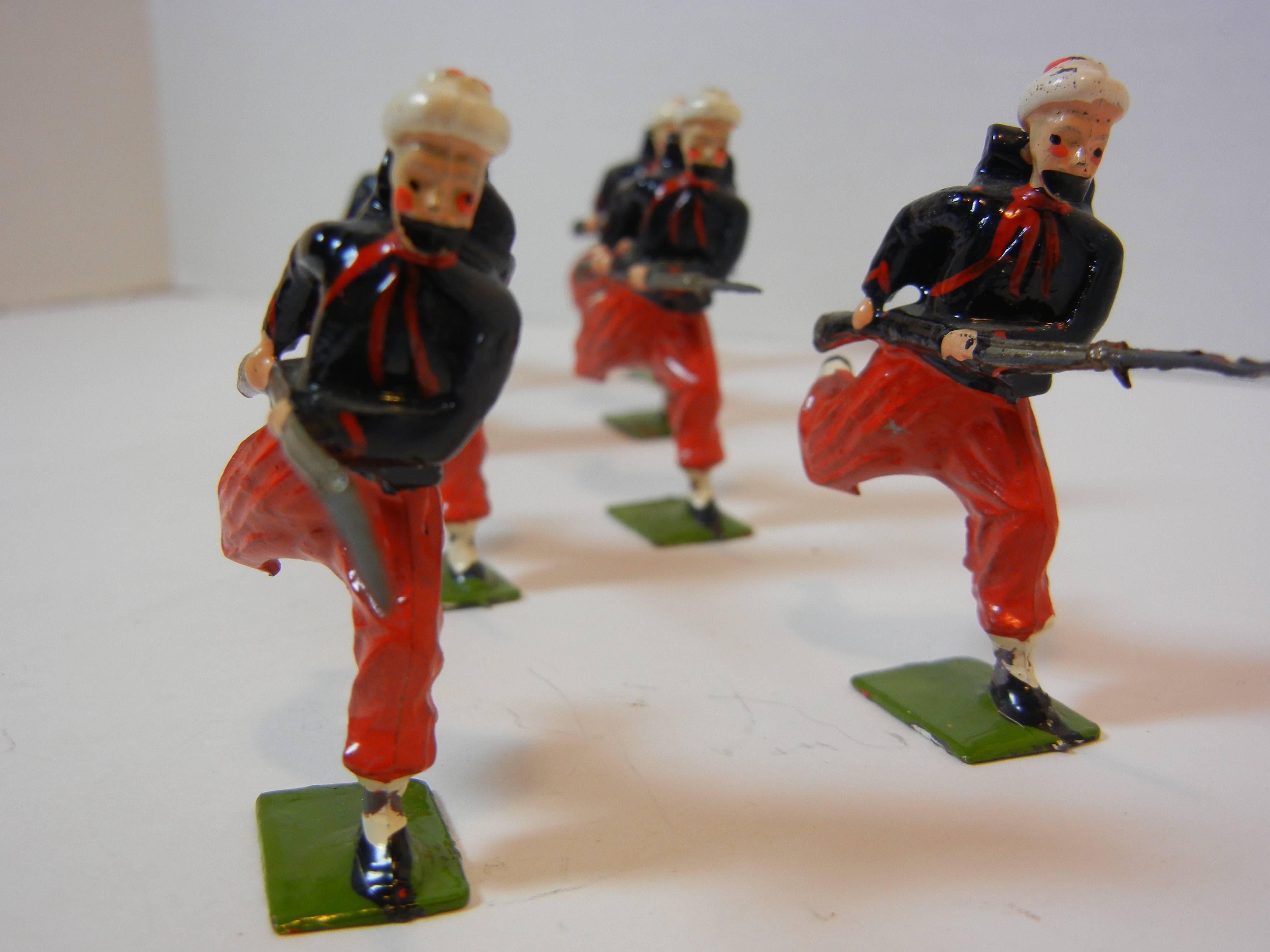 This lead-alloy set of toy soldiers is by Britains LTD of London, UK. It is an historically accurate depiction in hand-painted hollow-cast lead alloy, which was no longer legal to use in toys after 1966.

The set is all original. It was in