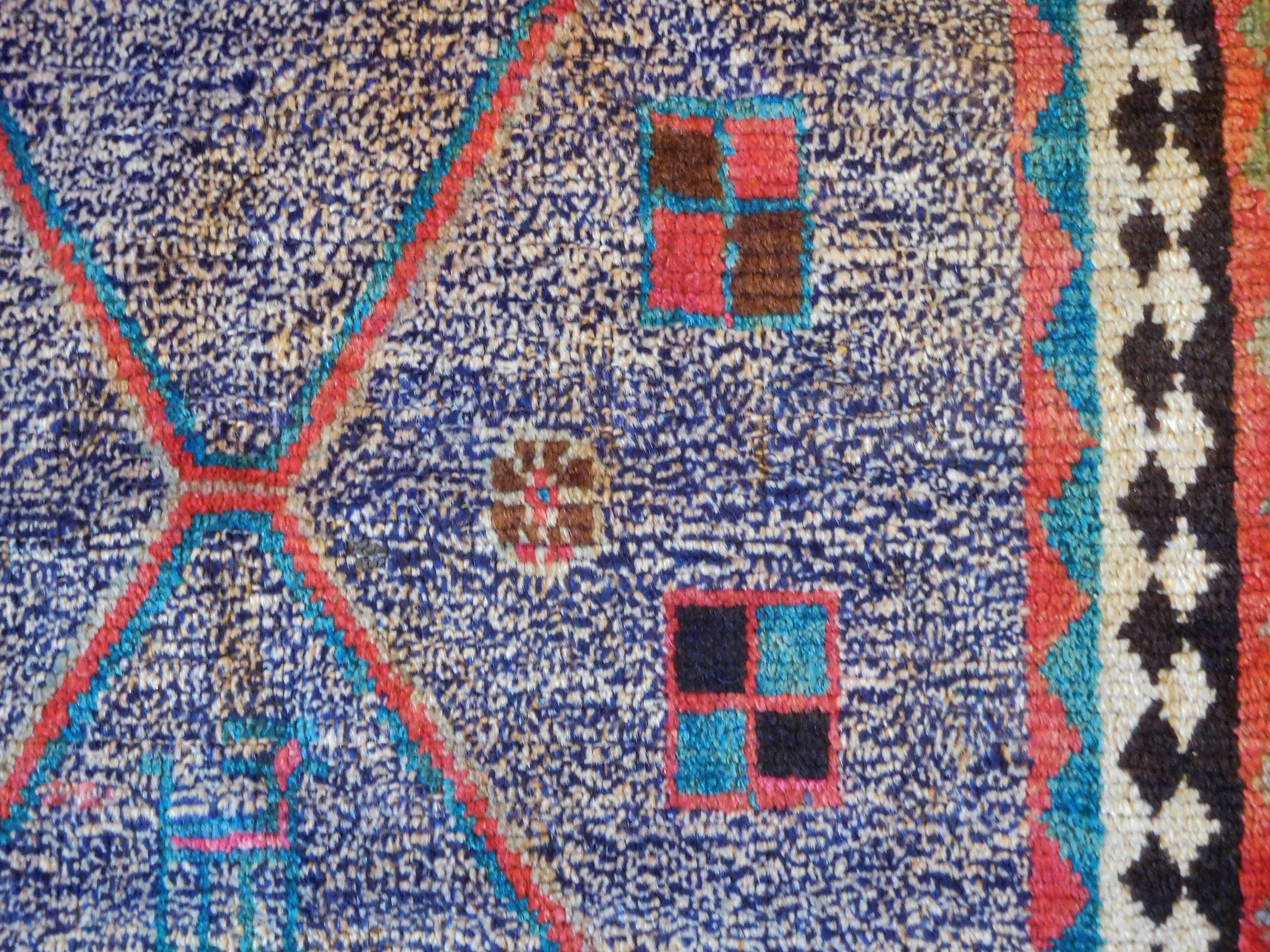 Wool Vintage Persian Gabbeh Rug with Blue Field and Traditional Symbols, circa 1985 For Sale