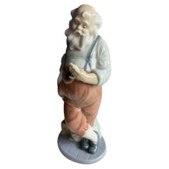 Limited Edition Lladró glossy porcelain figurine titled "Santa's Busiest Hour"