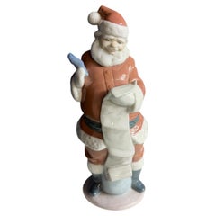 Figura de porcelana «La lista de Papá Noel» de Lladró, con caja de autenticidad y documentación