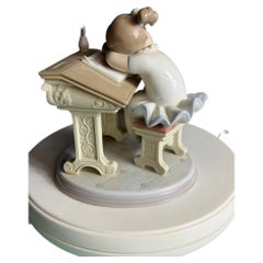 Lladró porcelain figurine titled "Waiting for the Bell"