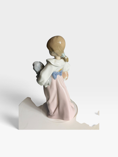 Lladro "Arms Full of Love" Girl Figurine by the world-renowned Spanish porcelain