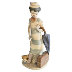 Lladró porcelain figurine titled "On The Move" (Spanish name: Payasito de Viaje)