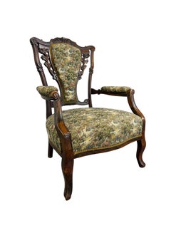 Antique Victorian parlor armchair showcasing masterful craftsmanship
