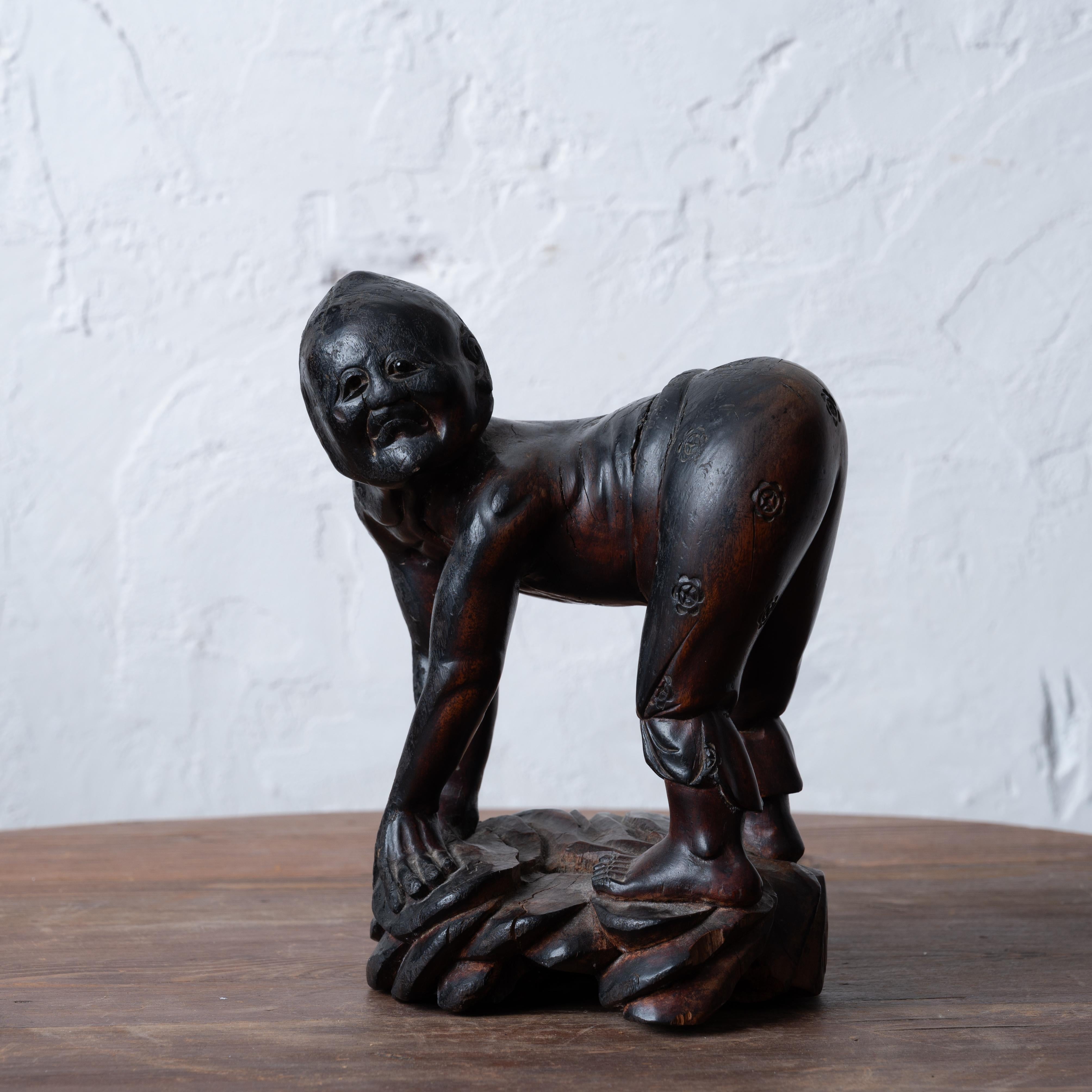 A japanese carved root yōkai figure, Meiji Period.



6 inches wide by 5 inches deep by 8 inches tall



