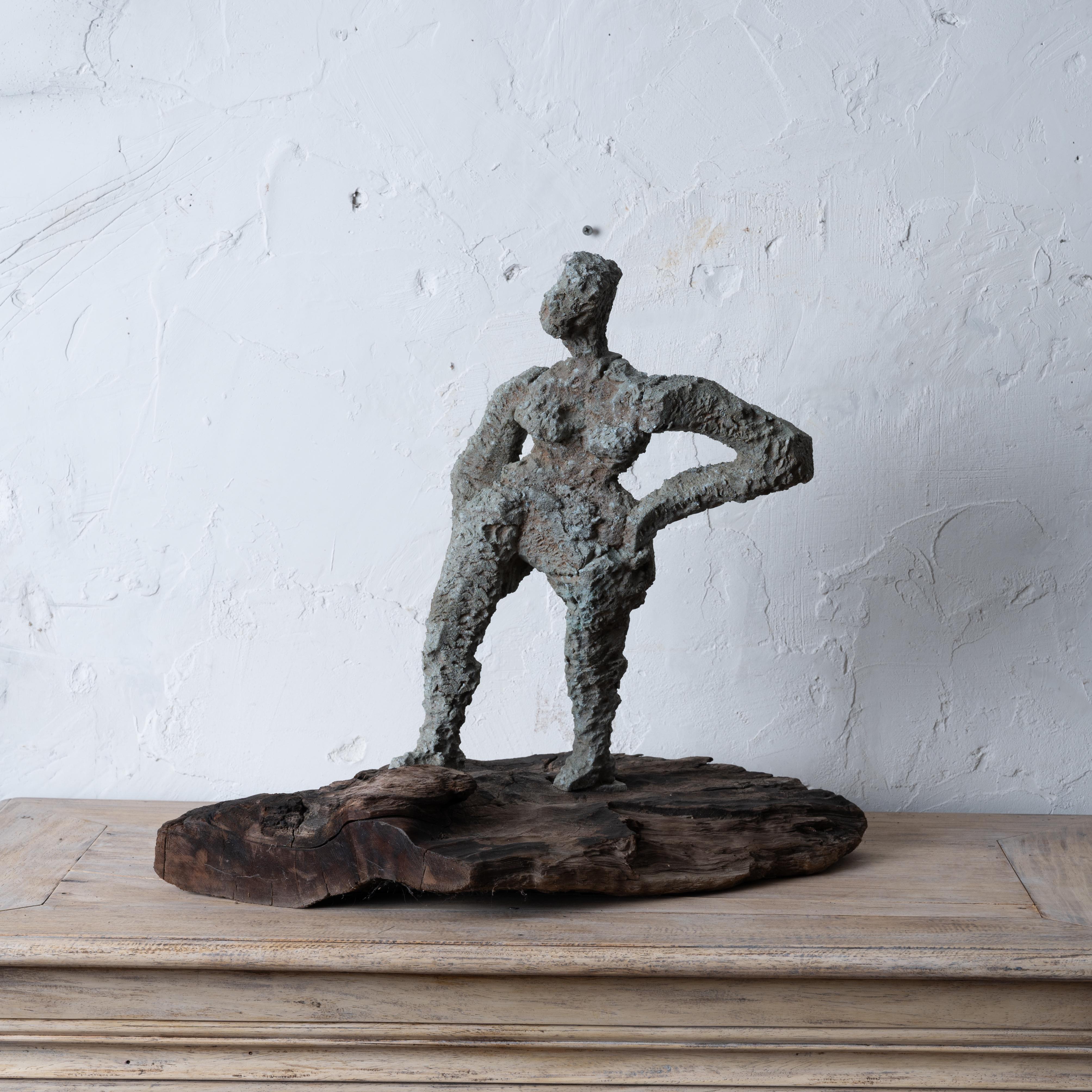 An unsigned abstract female metal sculpture on wood base, France, 1950s.



20 inches wide by 12 inches deep by 19 inches tall



