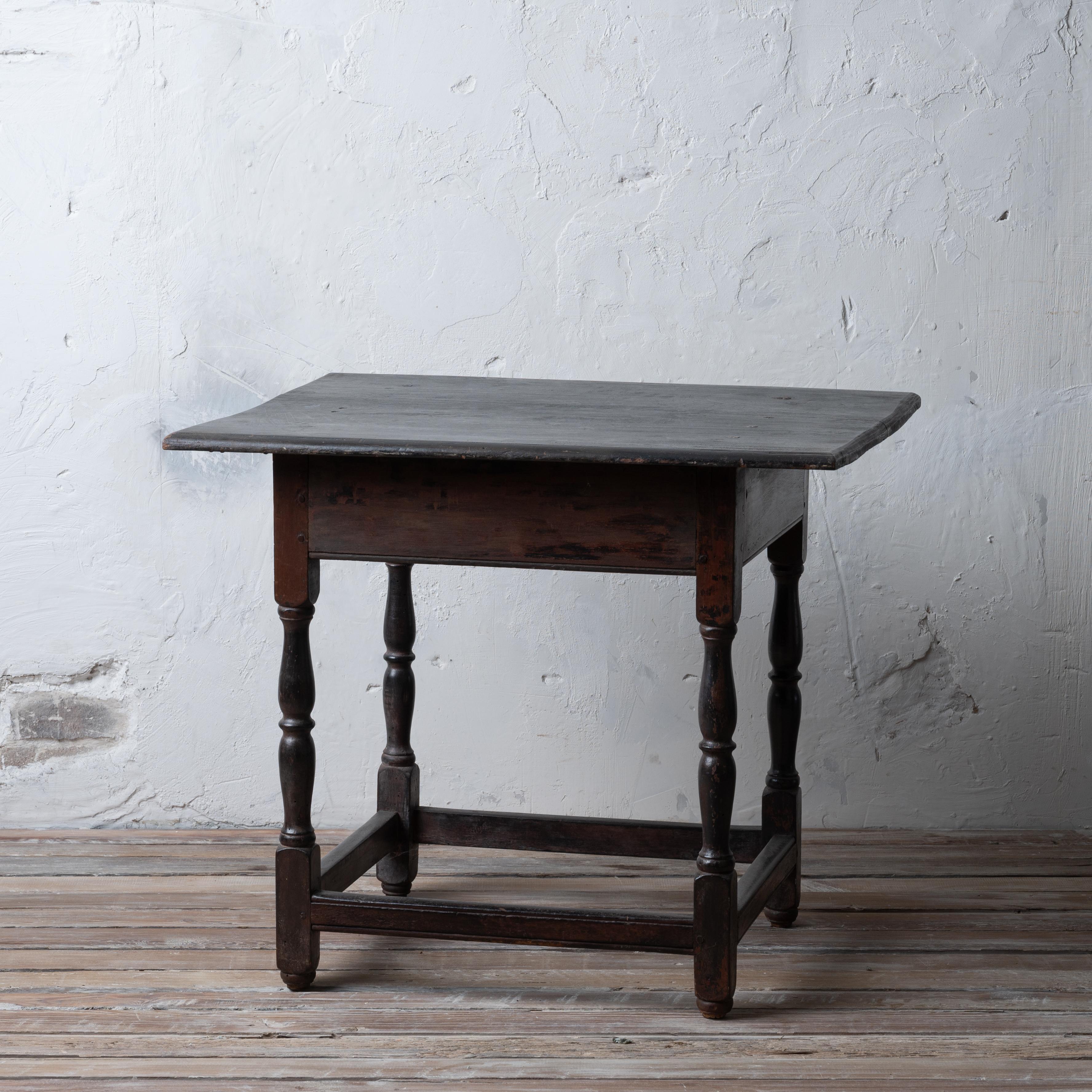 An American walnut tavern table, 18th Century.  

Signs of original red paint under later black or dark brown finish.  

Purchased in Yemassee, South Carolina from an elderly gentleman who claimed Drayton family lineage and inherited from his