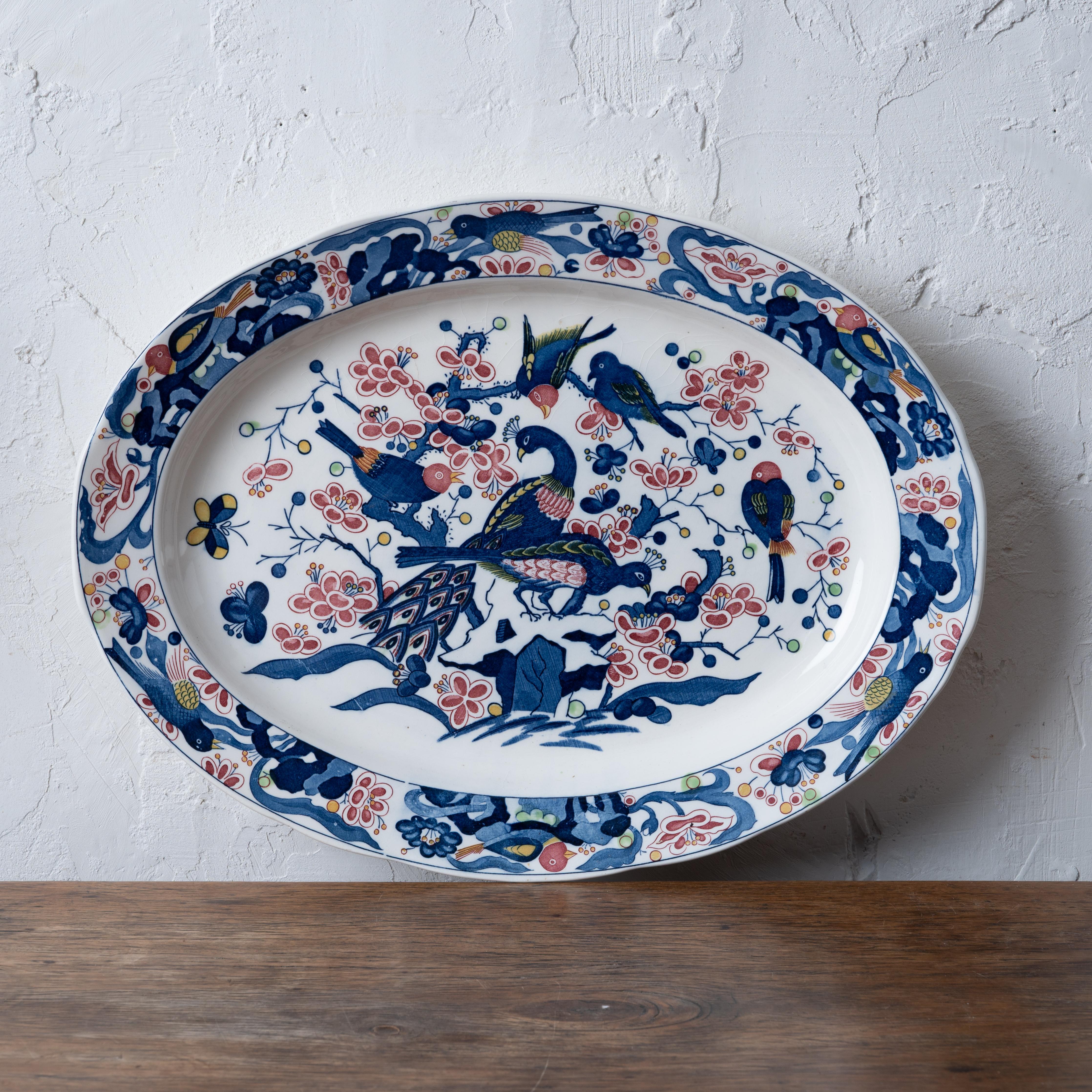 Plat ovale en porcelaine de transfert japonaise bleue et blanche avec scène d'oiseau, Vintage By.



18 ½ par 14 par 1 ⅞ pouces de hauteur



