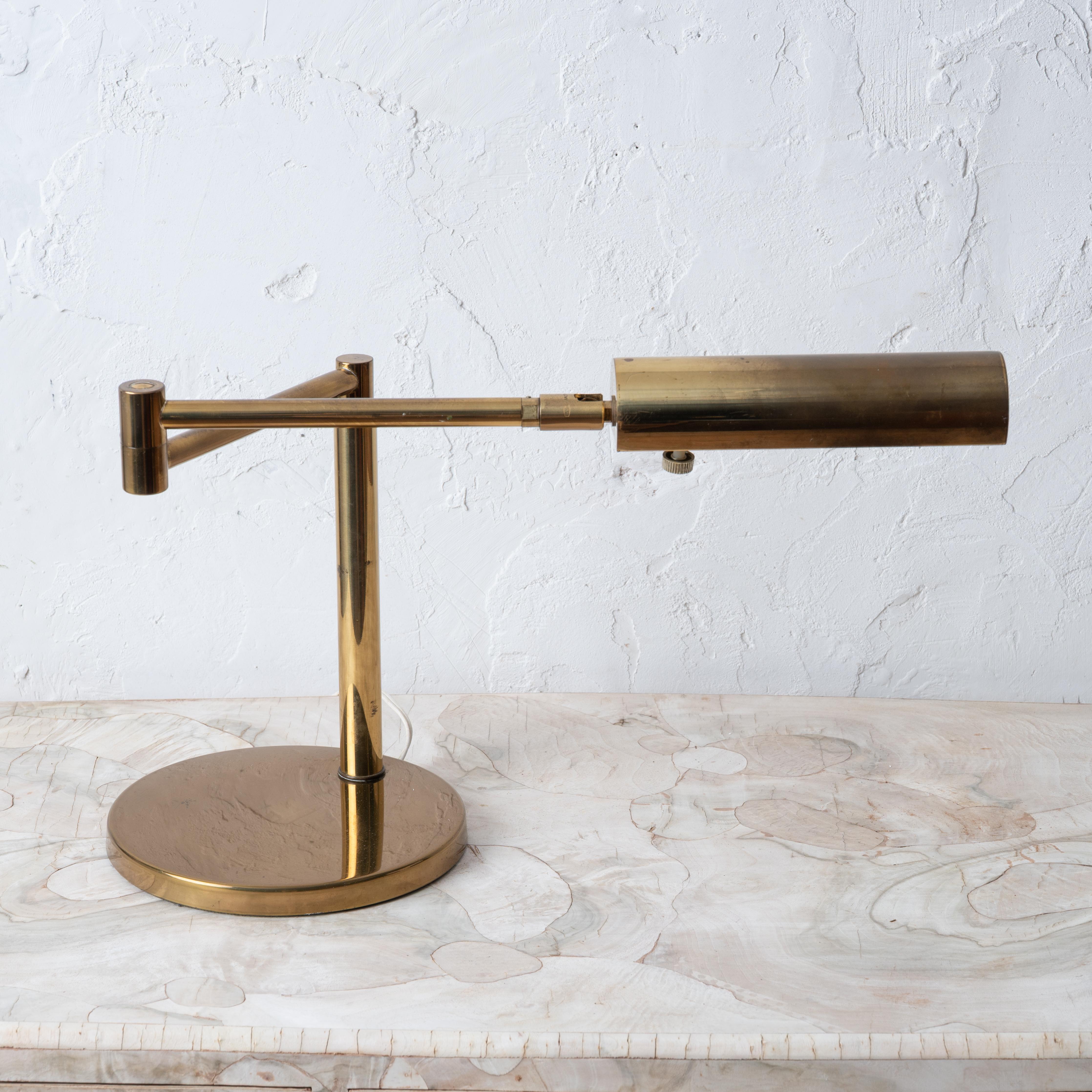 A Koch & Lowy articulating brass desk lamp, circa 1960.



23 inches wide by 12 inches deep by 8 ¼ inches deep; 26 ½ inches wide fully extended




