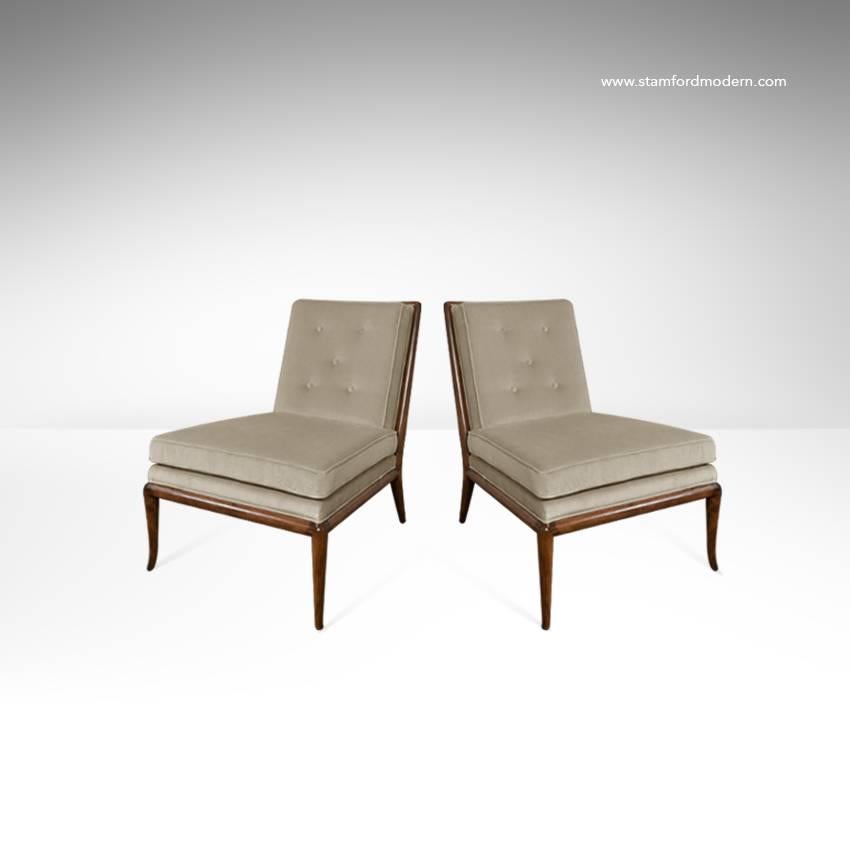 Pair of slipper chairs model number. WMB each in a walnut frame and newly upholstered in a taupe mohair. Designed by T.H. Robsjohn-Gibbings for Widdicomb. American, circa 1950.
 