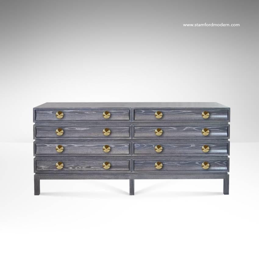 Paul Frankl inspired oak dresser designed and manufactured by Stamford Modern Originals. 

Handcrafted from solid oak in a limed or cerused finish. Eight drawers provide ample storage space. Solid dome-shaped brass pulls add the perfect touch of