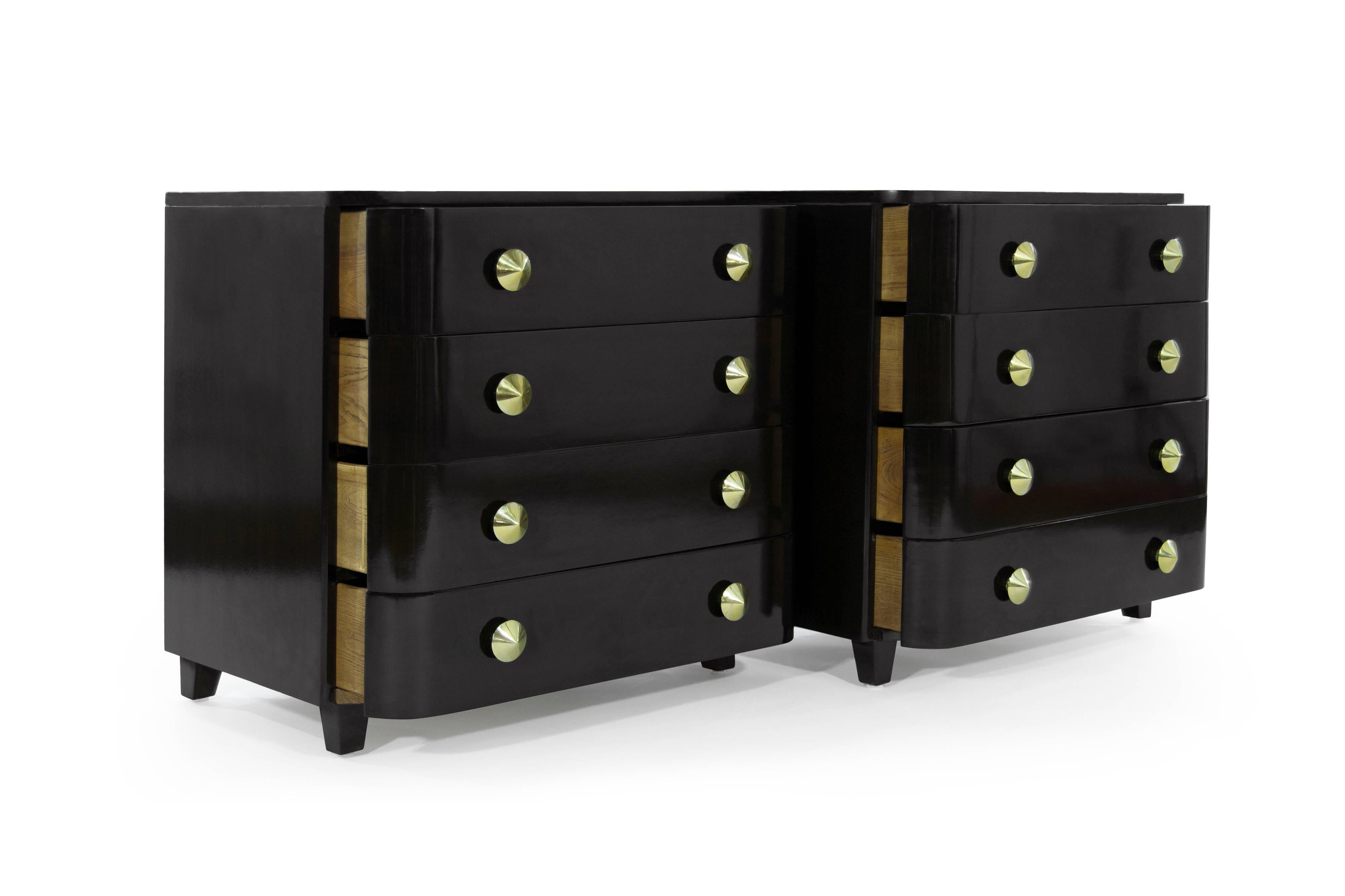 Early design by Paul Frankl pair of bachelors chests or dressers, circa 1940s.
Each chest features four drawers for ample storage as well as dome-shaped solid brass pulls newly polished. Fully restored.

  