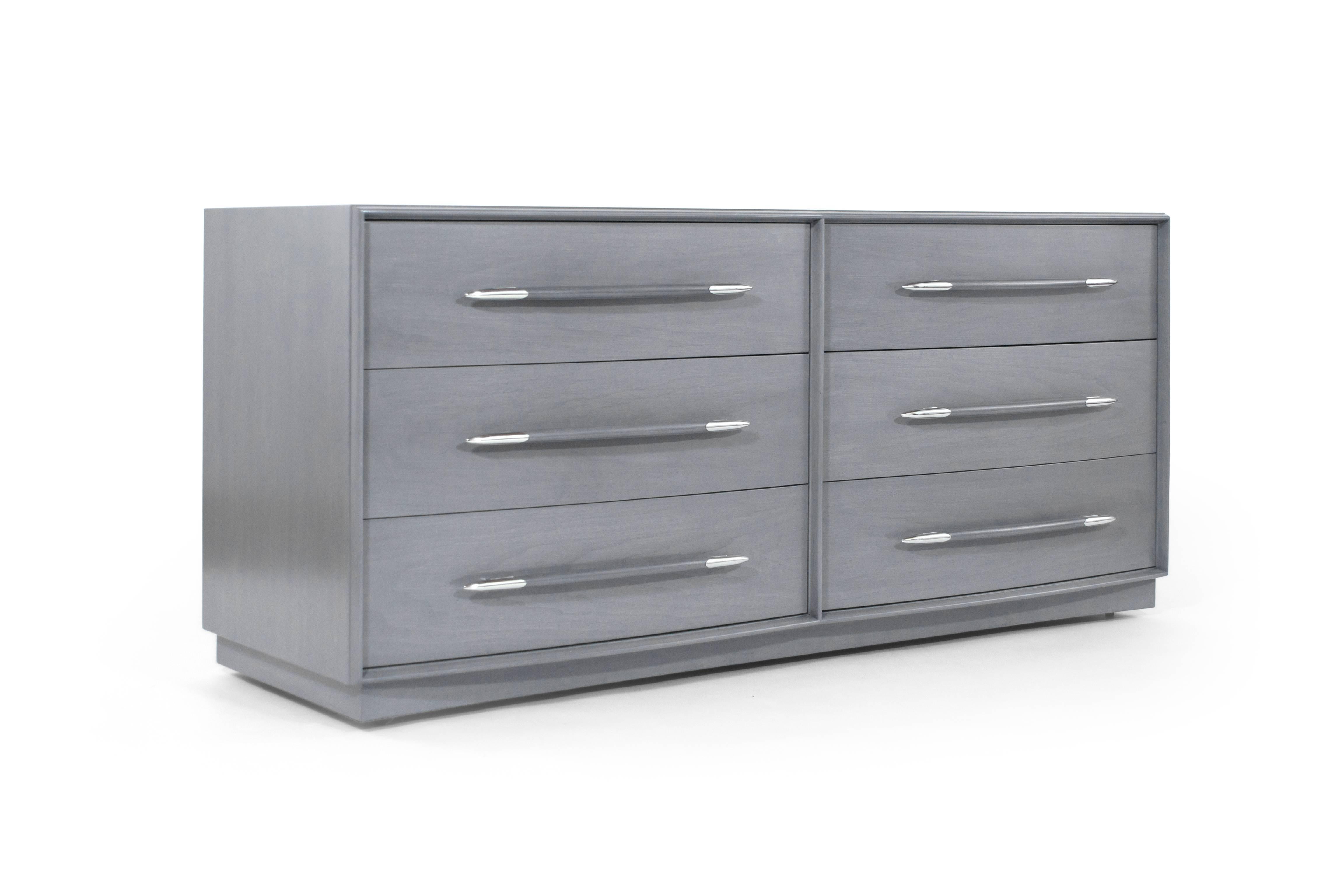 A T.H. Robsjohn-Gibbings for Widdicomb dresser fatalistically redone in grey. Six deep drawers provide ample storage space.