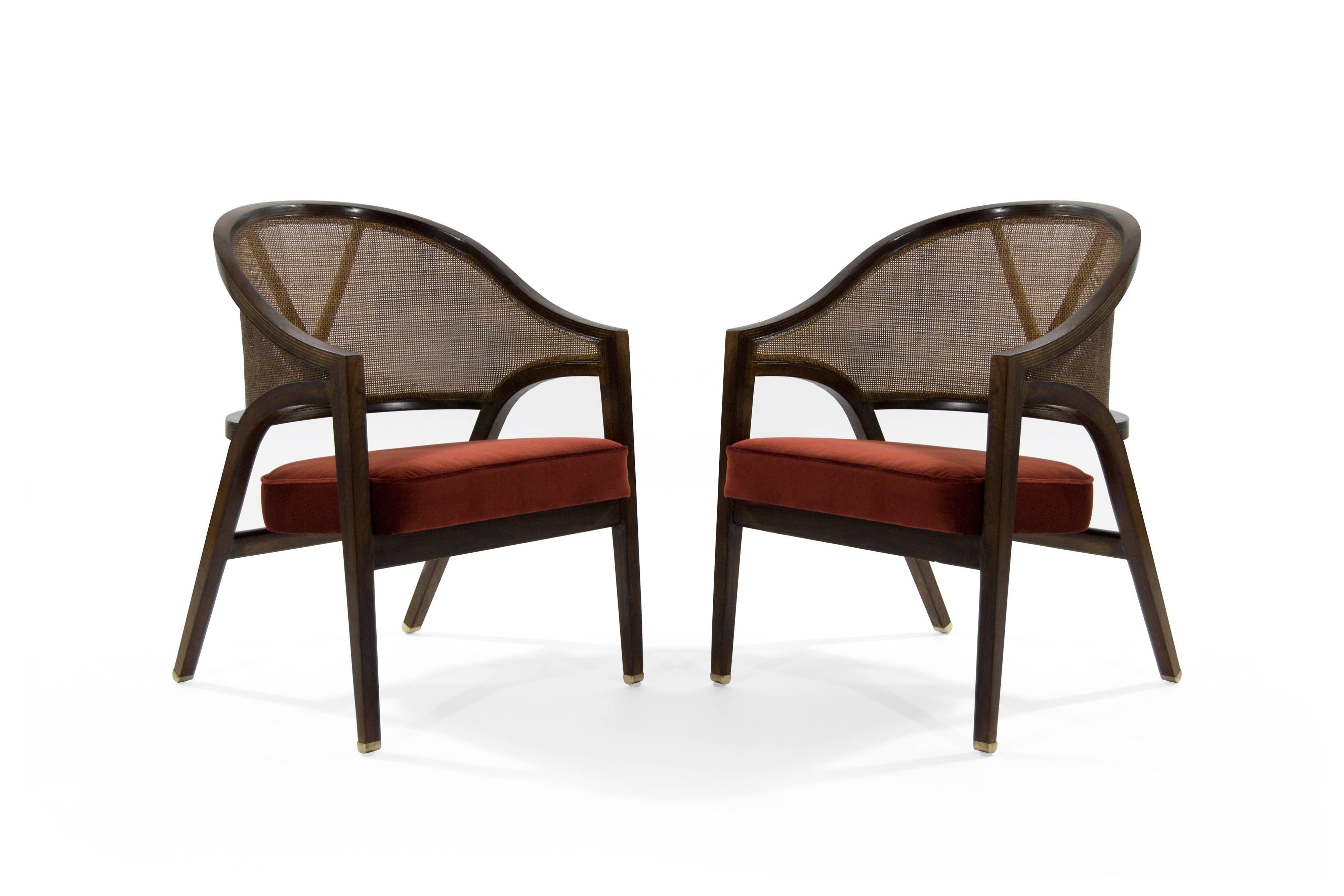 Exquisite and rare pair of armchairs labeled 