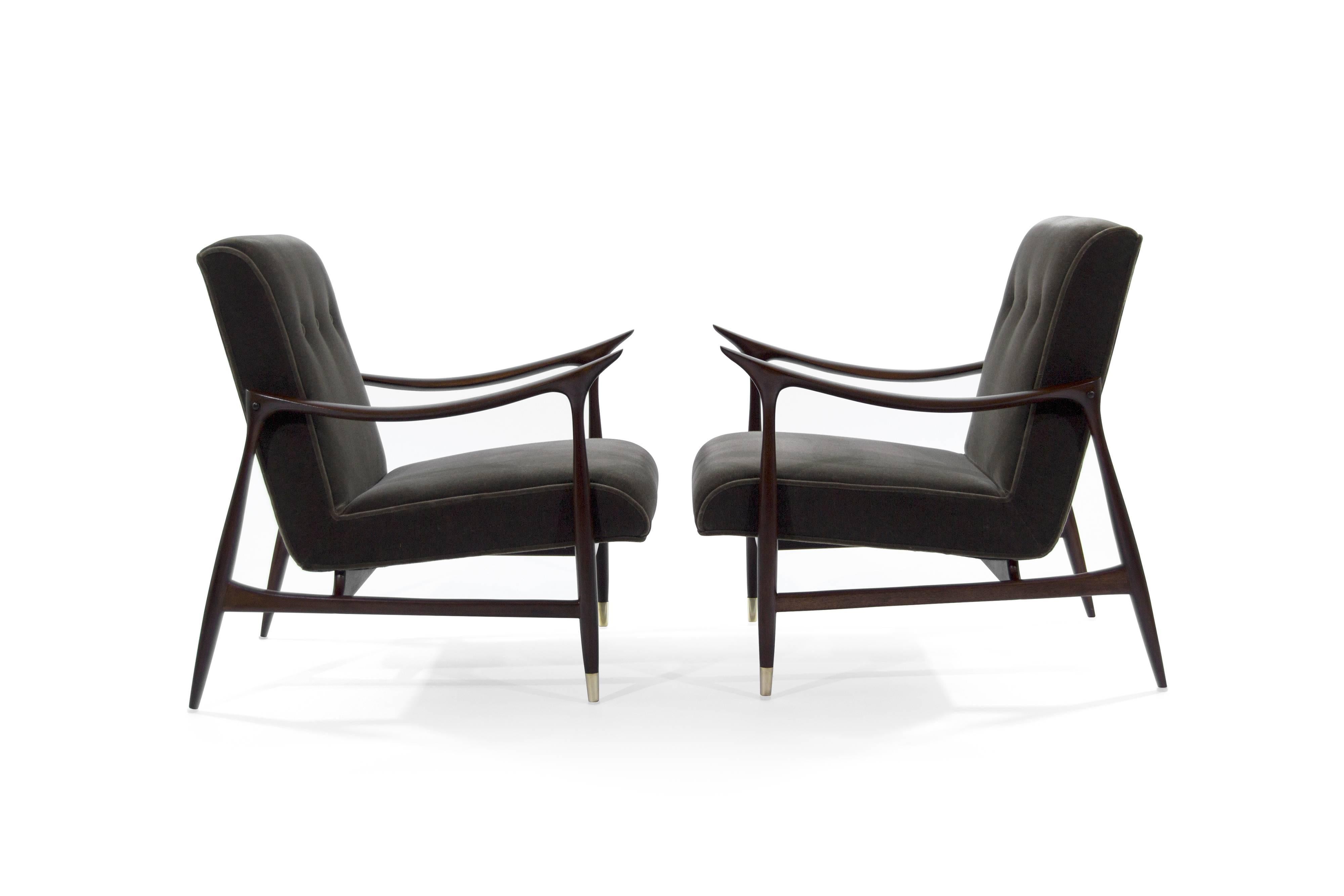 Absolutely stunning pair of Jorge Zalszupin inspired lounge chairs featuring fully restored sculptural frames in Brazilian jangada wood. Newly upholstered in charcoal mohair. Brass sabots newly polished.