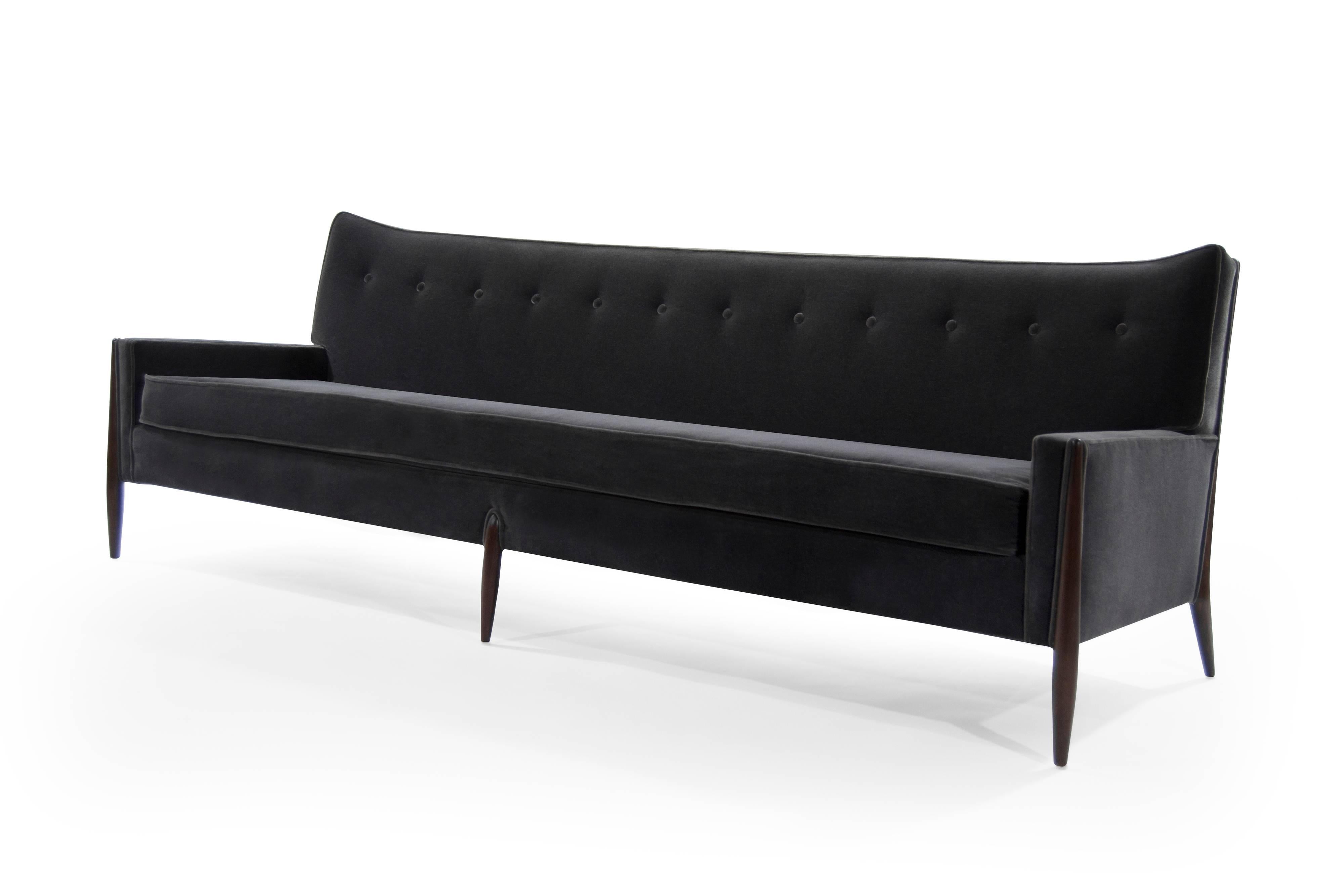 Long and comfortable Mid-Century Modern sofa designed by Jules Heumann for Metropolitan, circa 1960s.

Newly upholstered in charcoal mohair. Walnut fully restored.